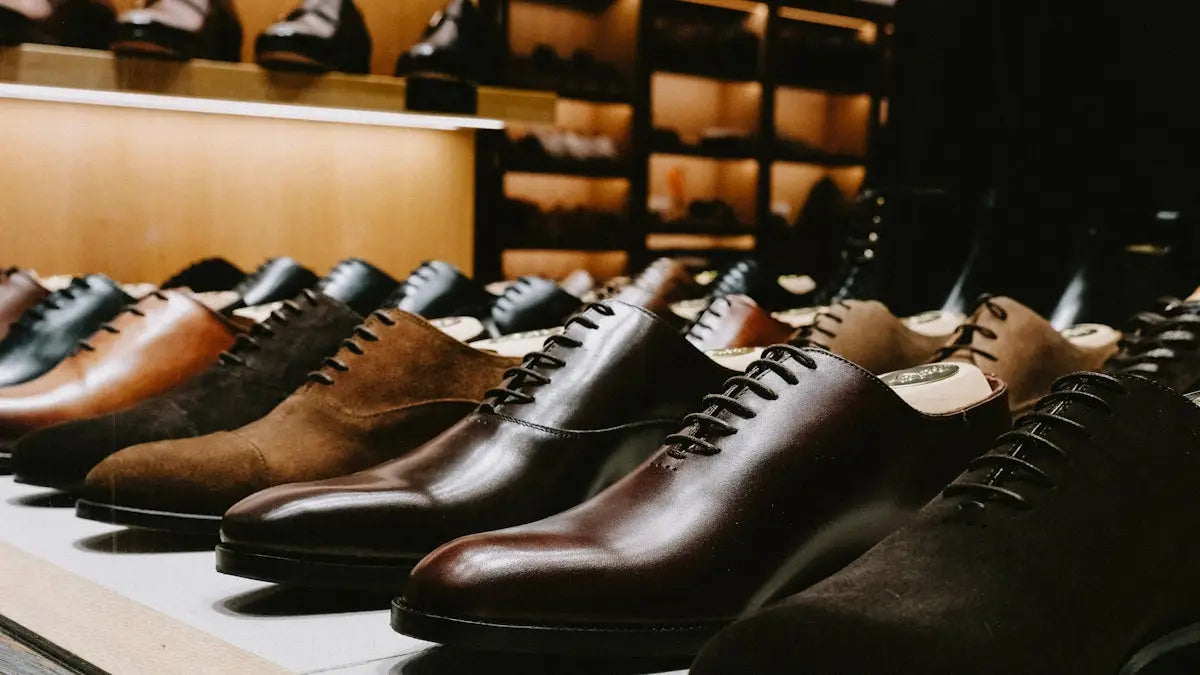 Classic brown leather dress shoes with laces and pointed toes.