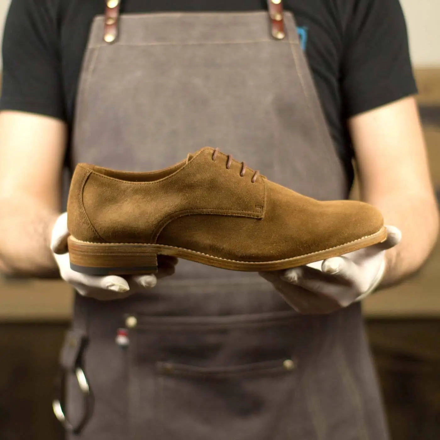Brown suede dress shoe.
