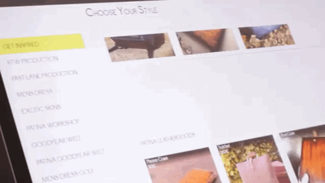 Modern wooden coffee table with a sleek black finish and natural wood grain texture, inspired by restoration hardware.