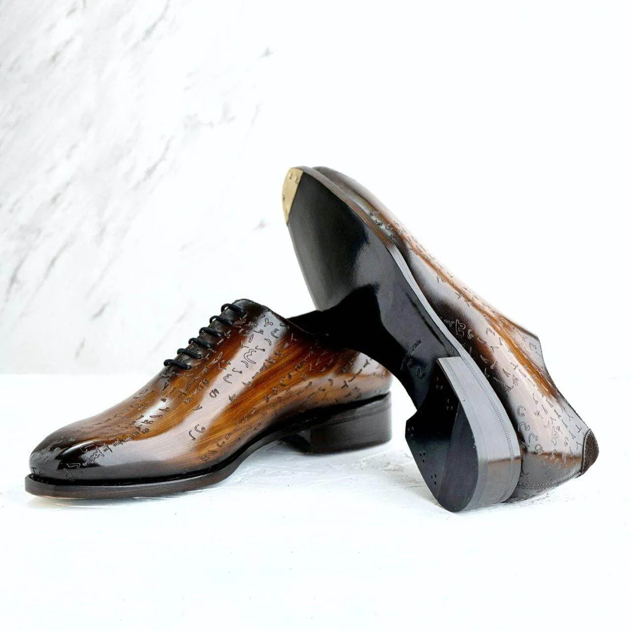 Brown Arabic matrix patina wholecut shoes in Italian crust leather