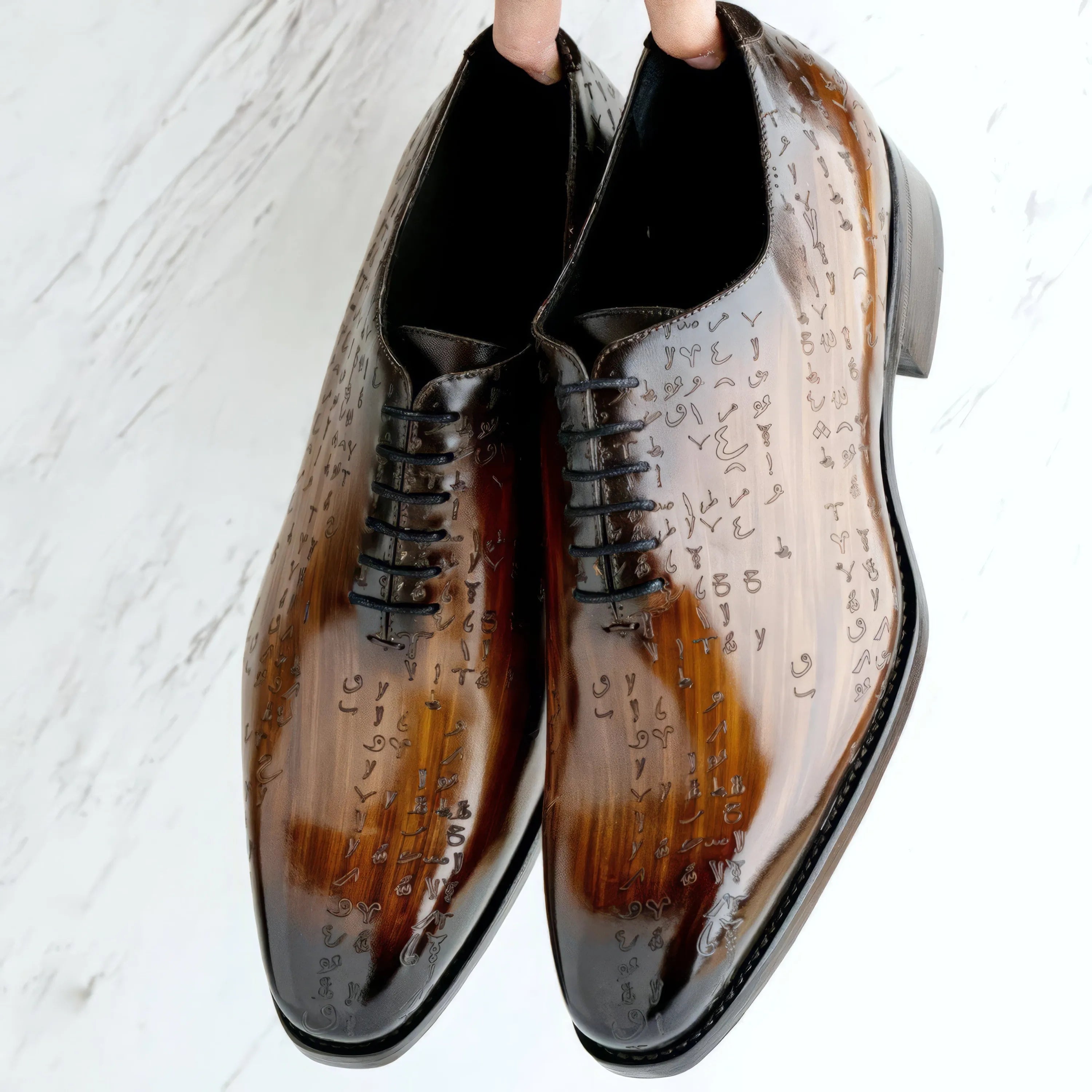 Arabic matrix patina wholecut shoes in brown Italian crust leather
