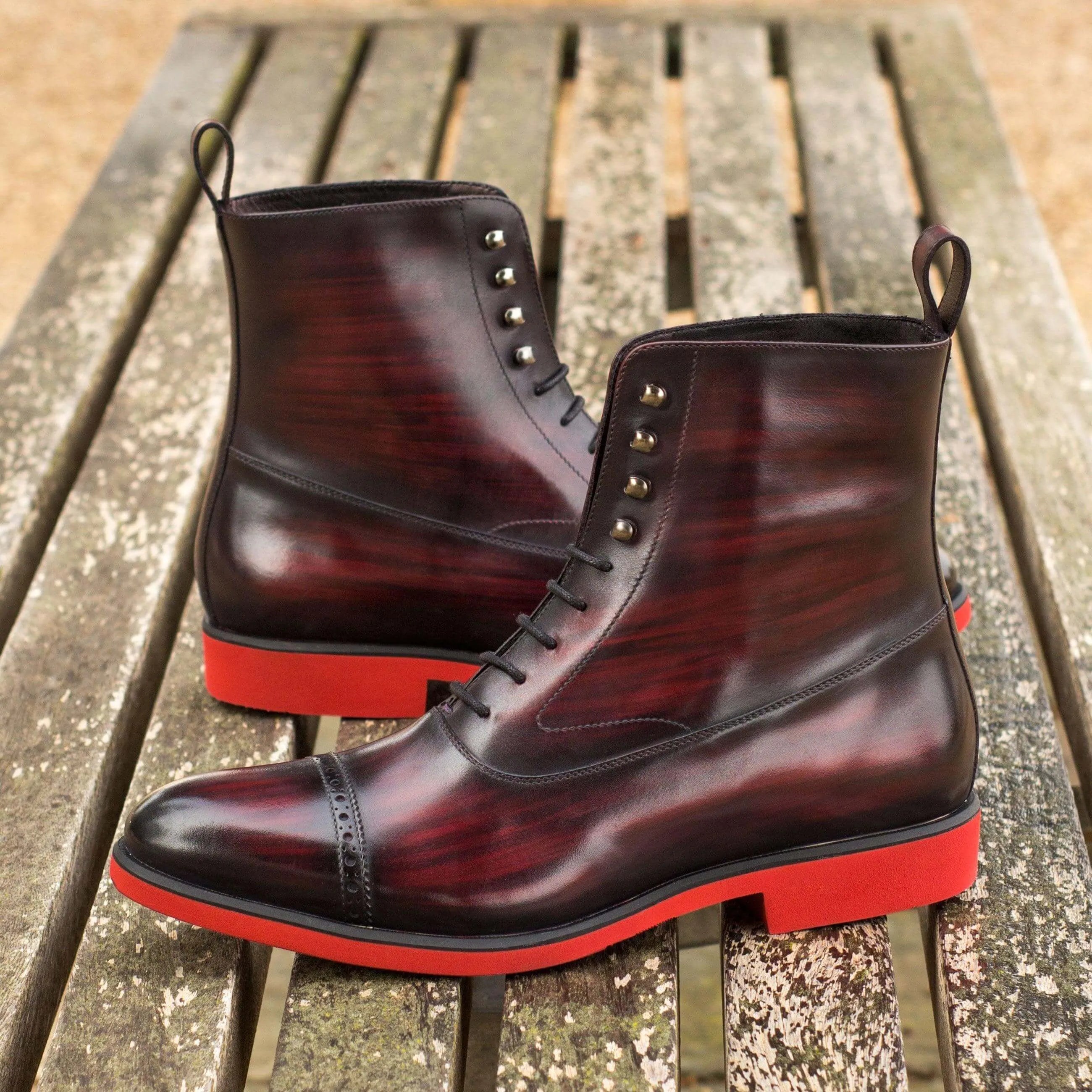 B61 Balmoral patina boots II in burgundy leather with red soles