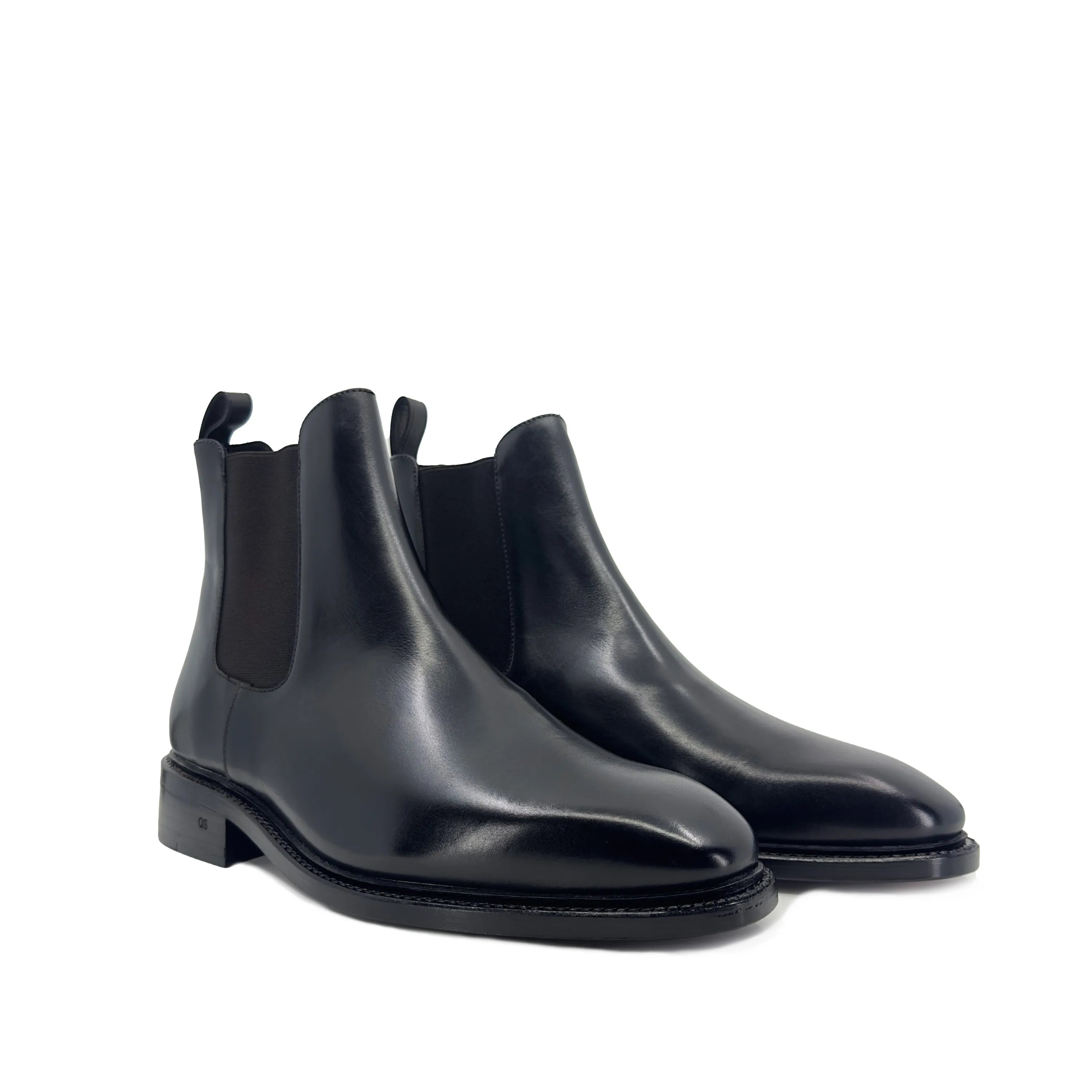 Pair of black leather Cave Chelsea Boots II