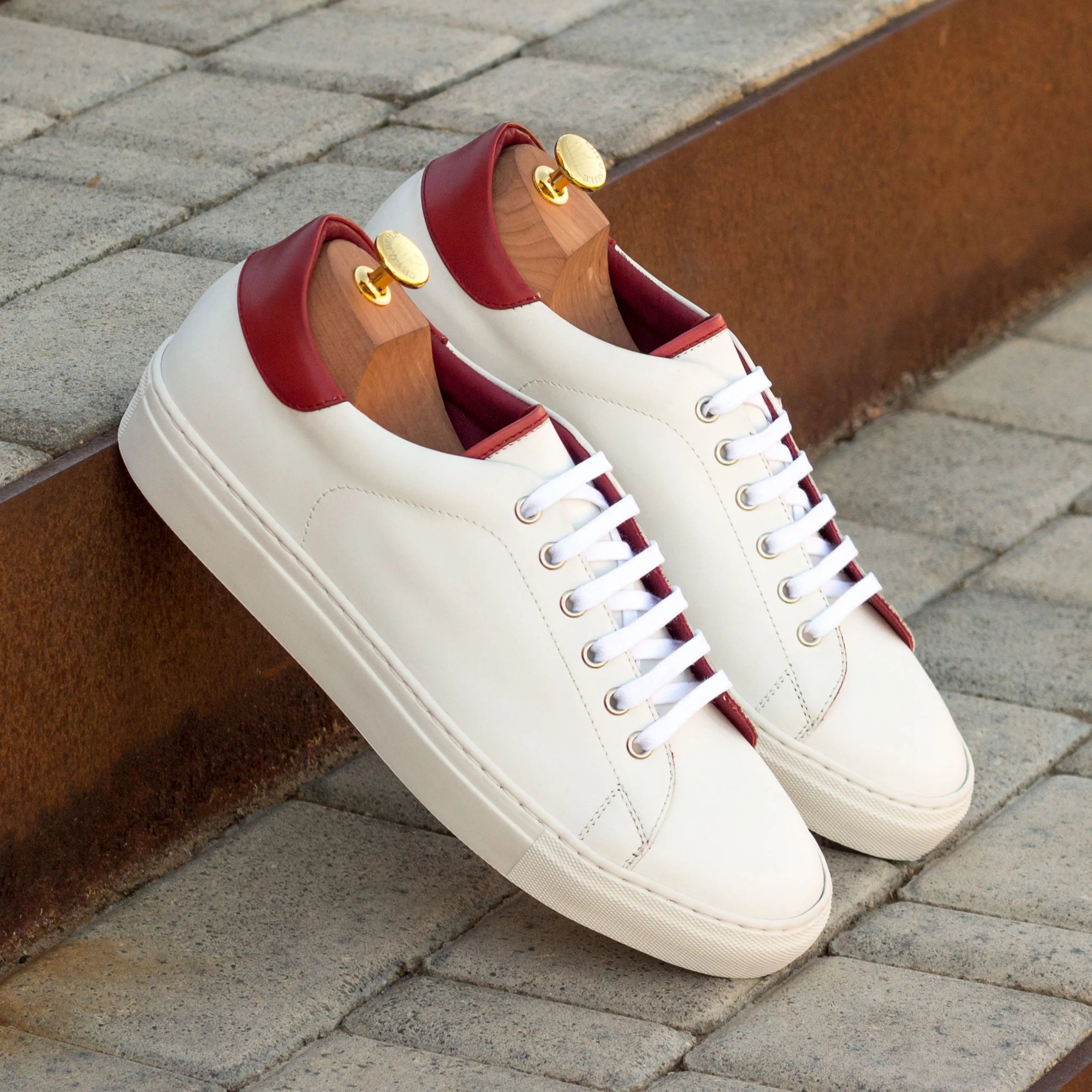 White Cyril Trainer Sneaker with red accents on leather