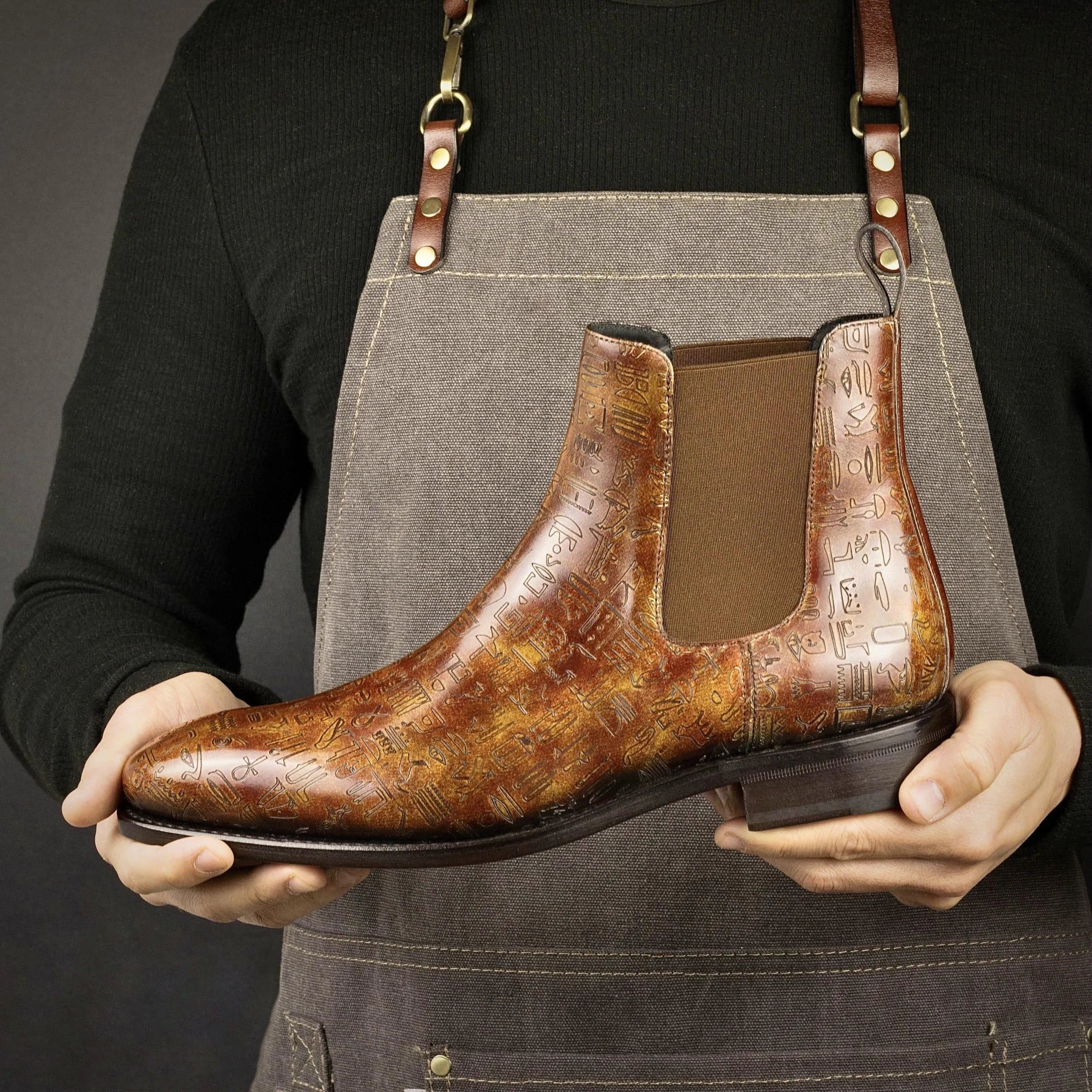 Brown patina Chelsea boots in Italian crust leather with hieroglyphics