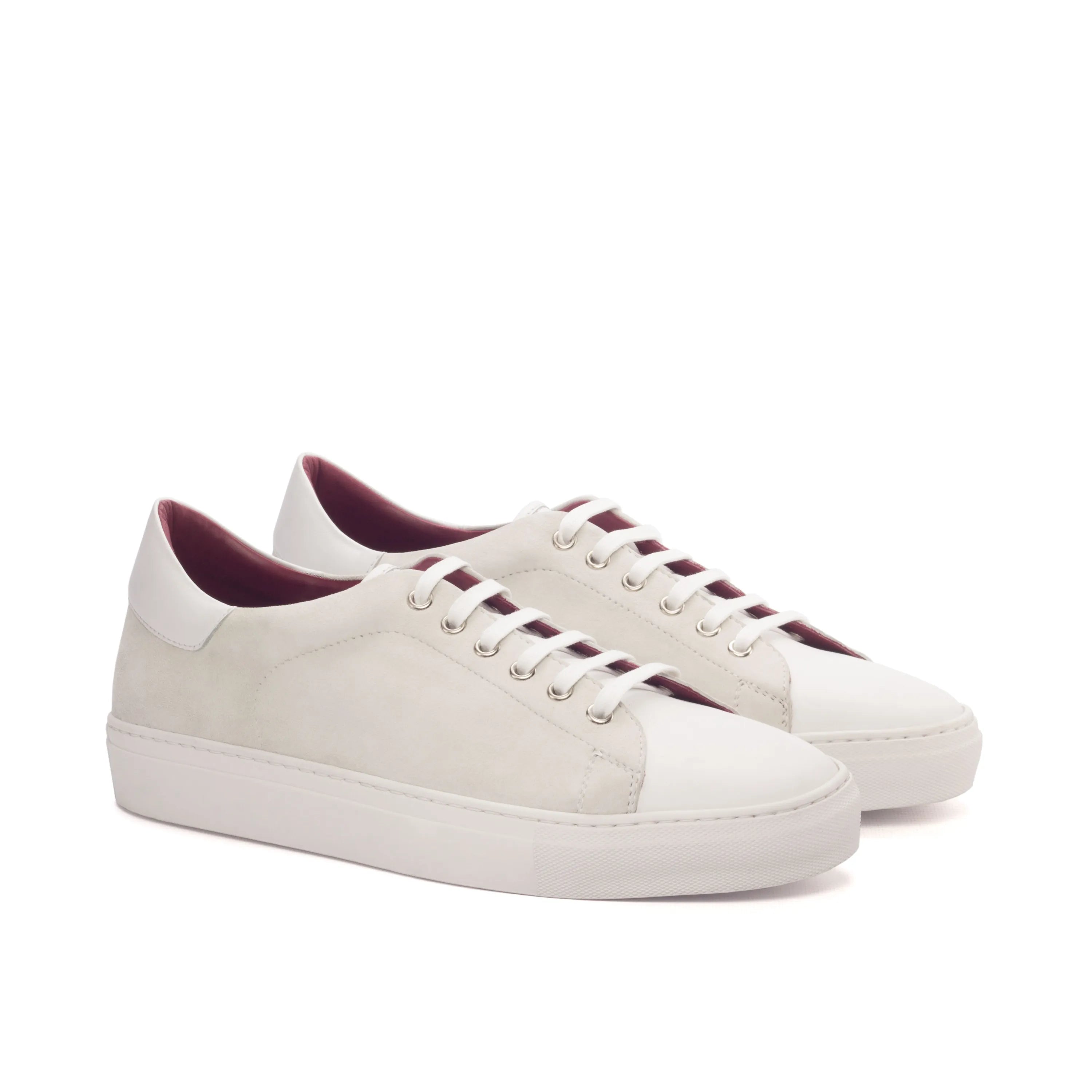 Pair of white leather Evander trainer sneakers
