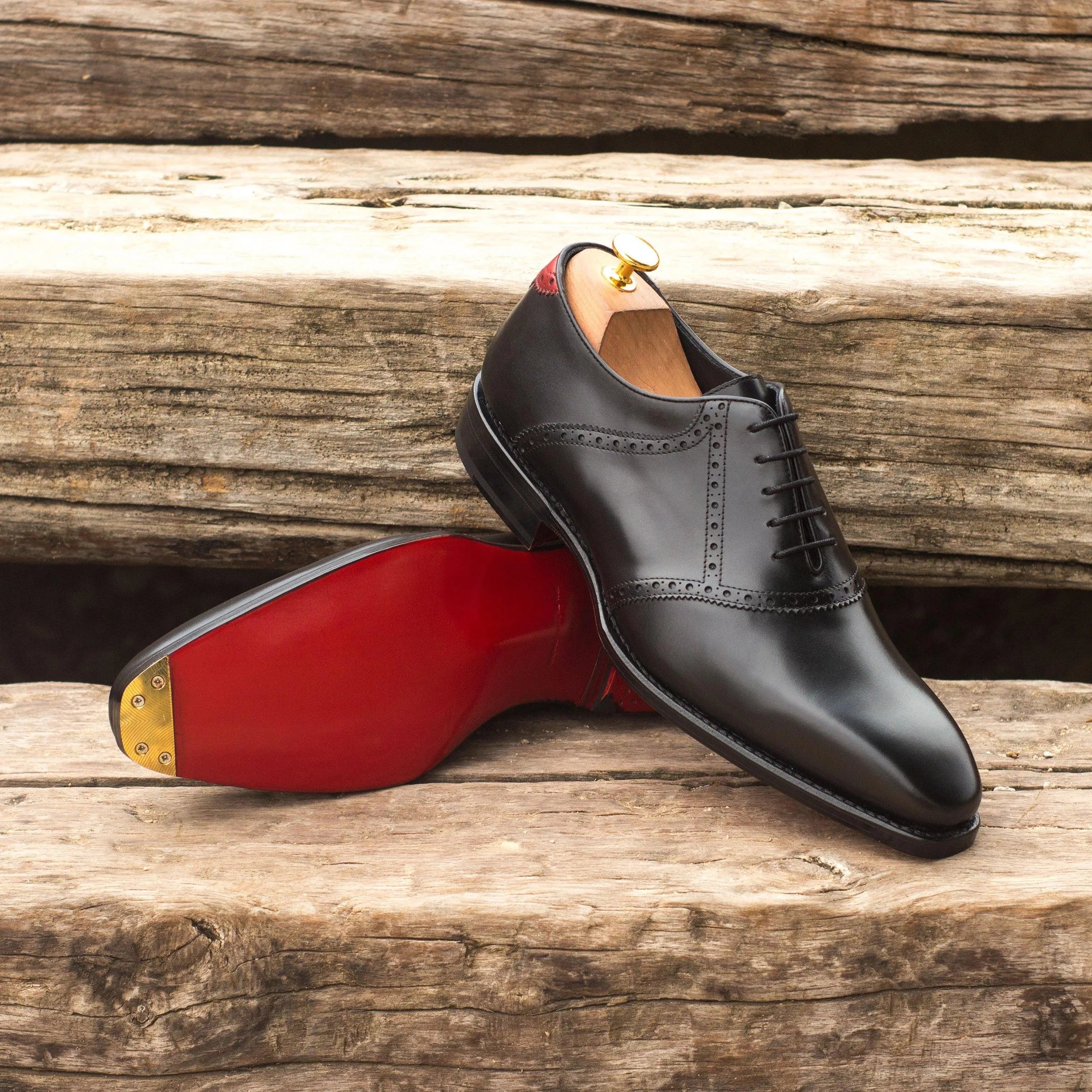 Black Iron Saddle shoes with leather uppers and red soles