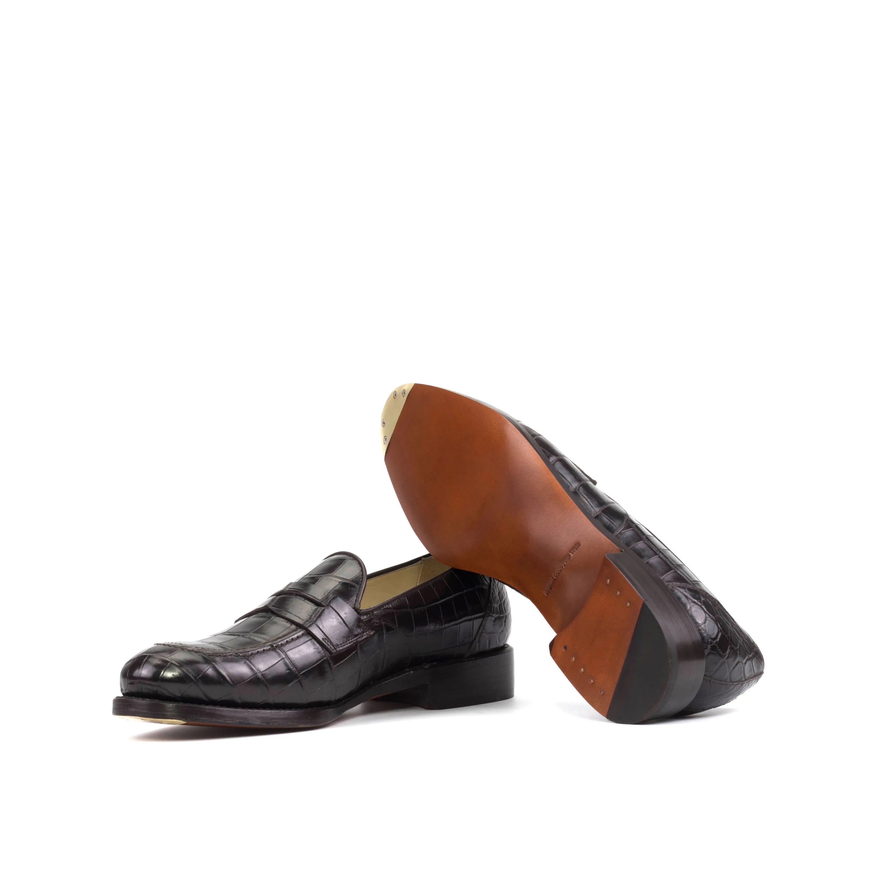 Black leather penny loafers in Karma Alligator style