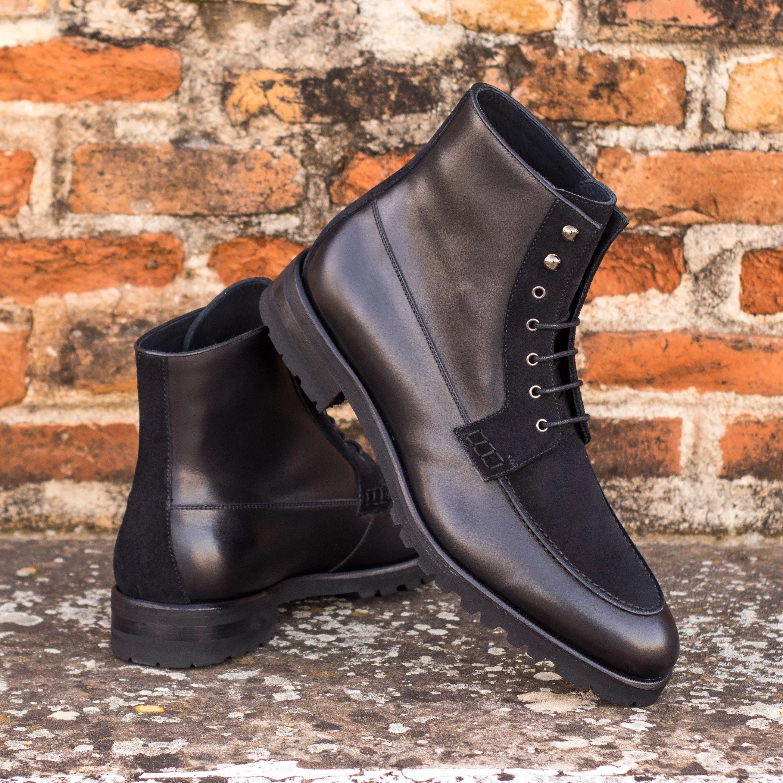 Kindrick moc boot: pair of black leather and suede boots