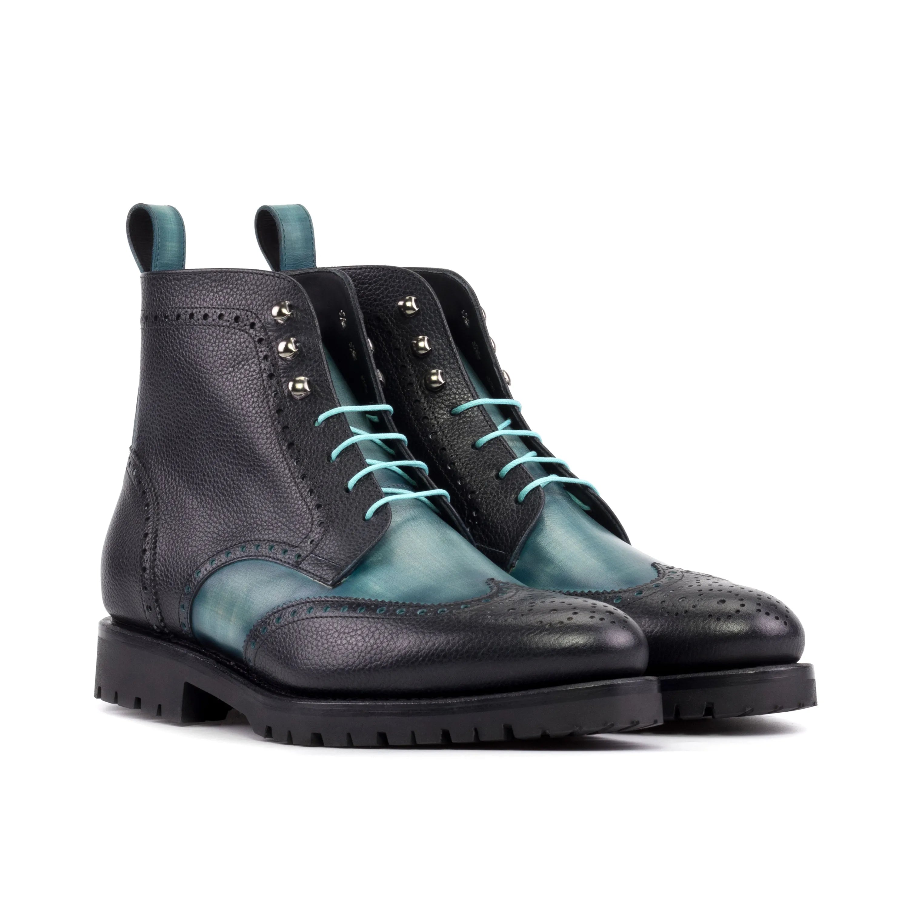 Manolo Patina military brogue boots in two-toned leather wingtip design