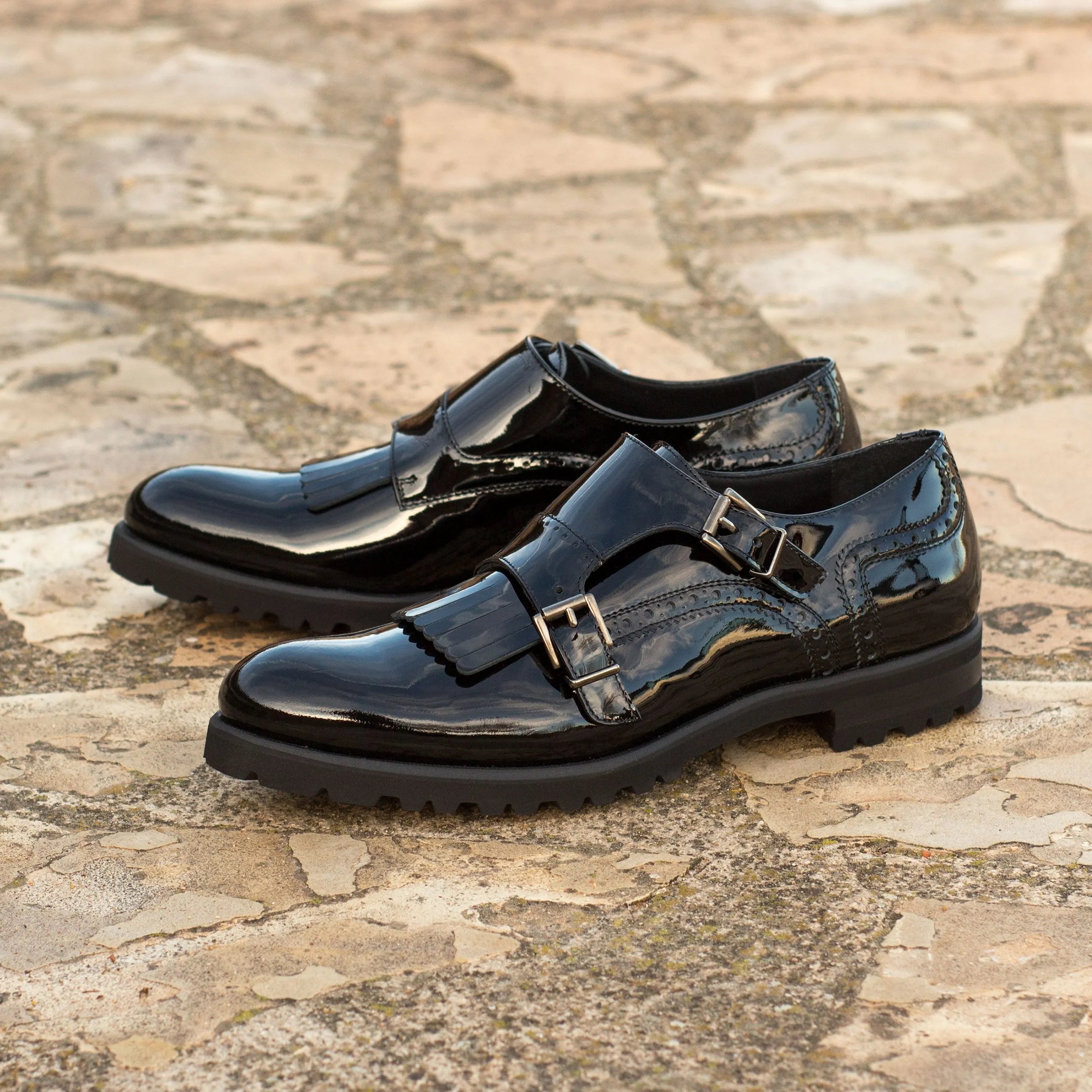 Nora Kiltie unisex monk strap shoes, shiny black pair back view