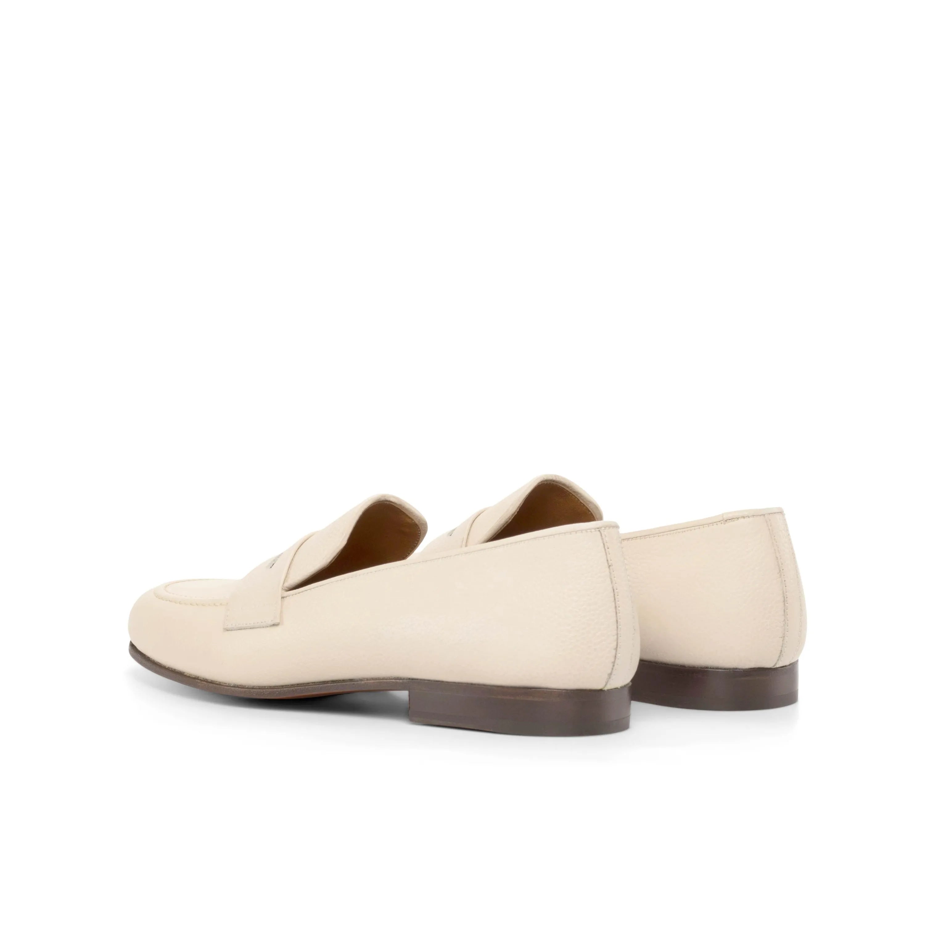 Pair of beige leather Olgo Wellington slip on loafers