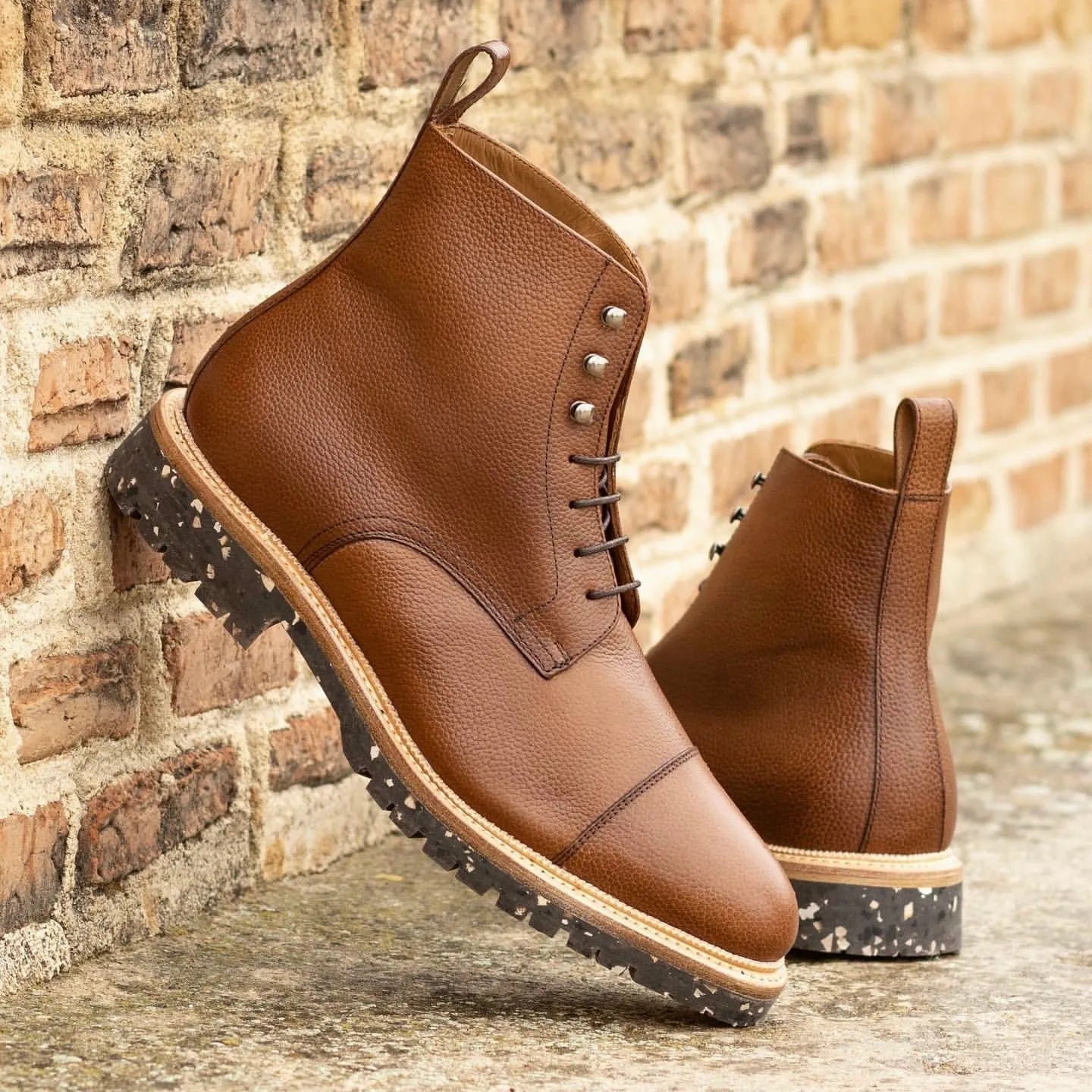 Back view of Senio Jumper Boots II in brown leather with classic cap-toe