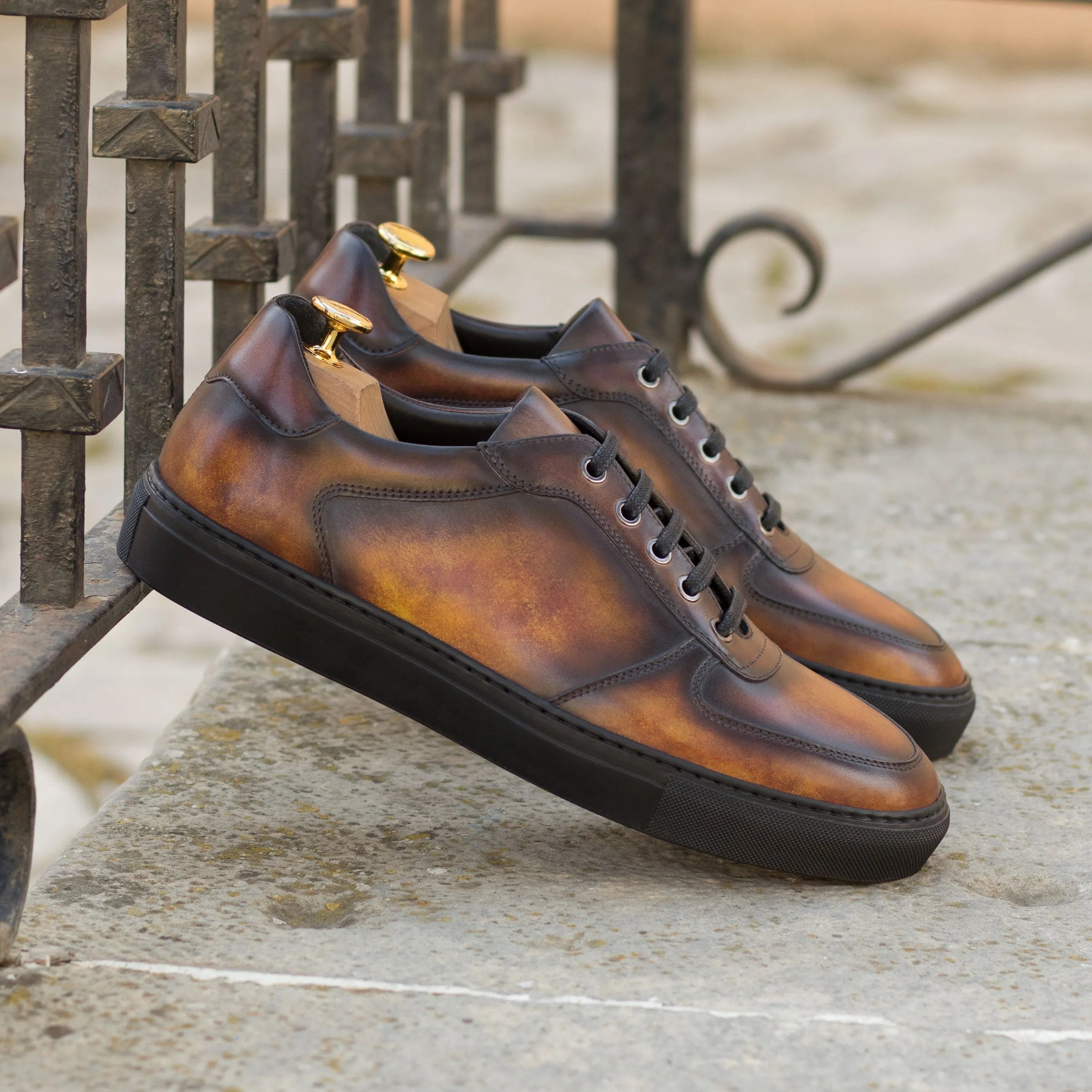 Talsa Patina Low Top Sneaker II in brown leather with black soles