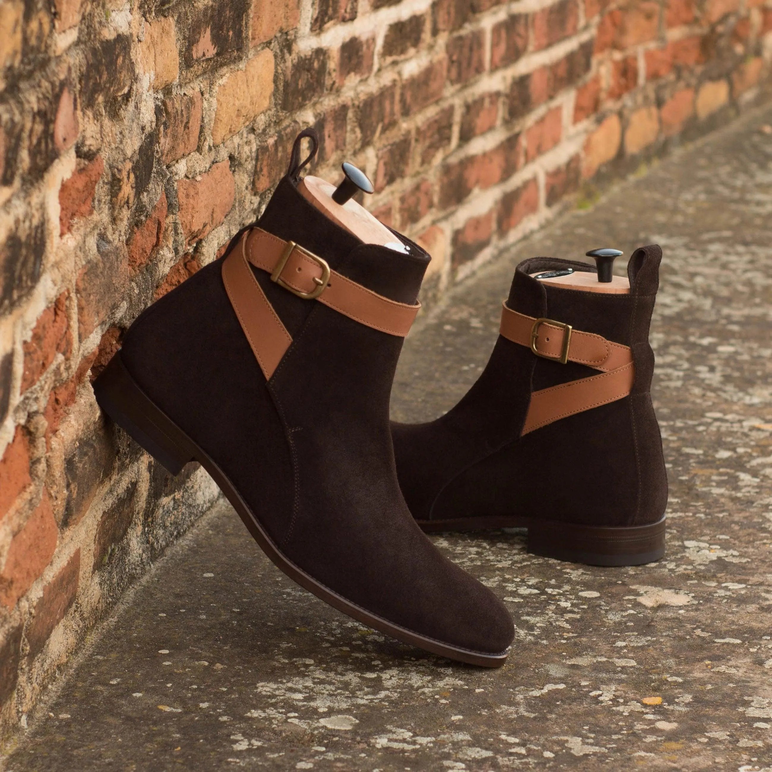 Pair of brown suede Wapasha Jodhpur Boots II with tan leather straps