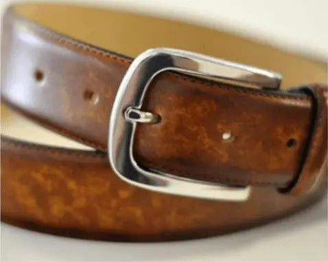 Brown leather belt with silver buckle.
