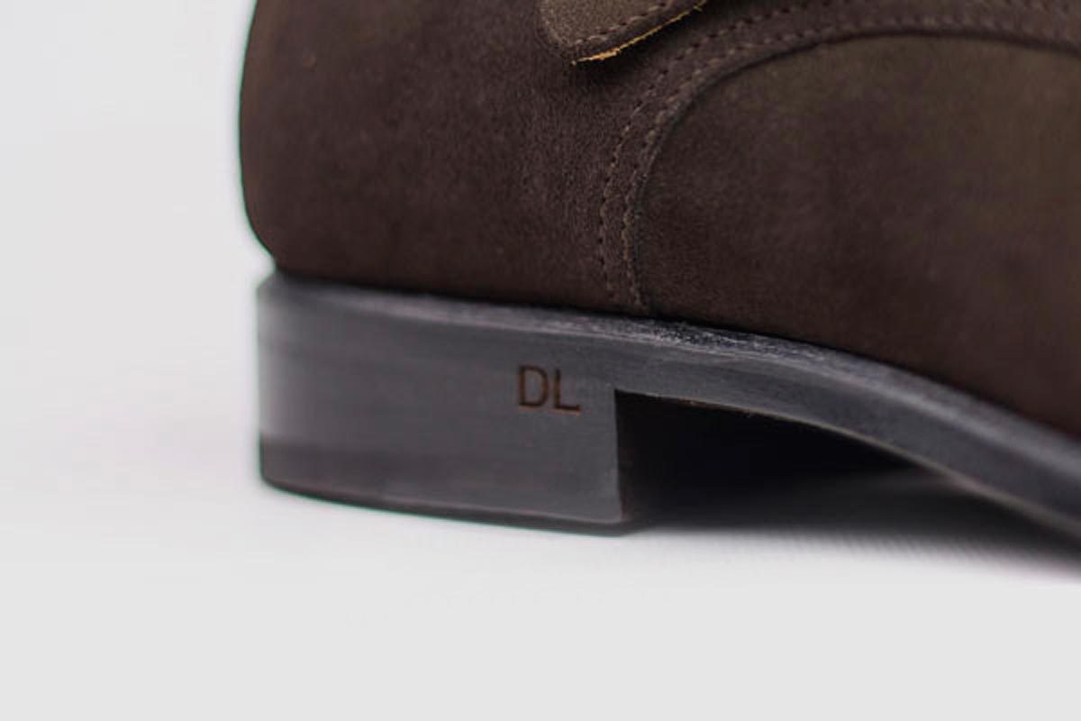 Brown leather shoe heel.