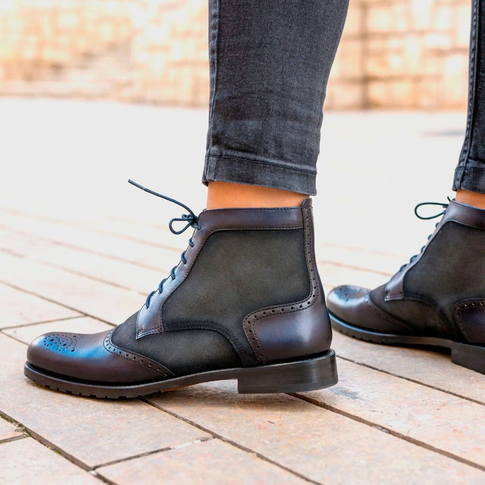 Leather and fabric lace-up ankle boots.