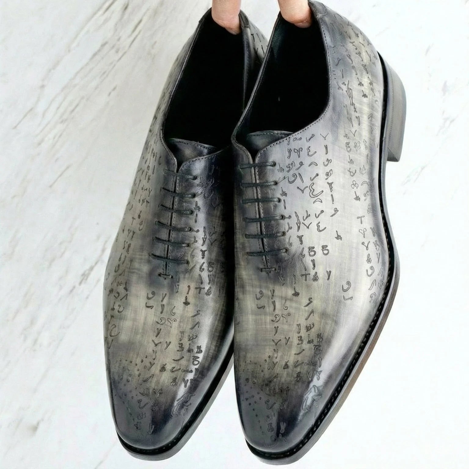 Black Italian crust leather night patina shoes with engraved Arabic patterns