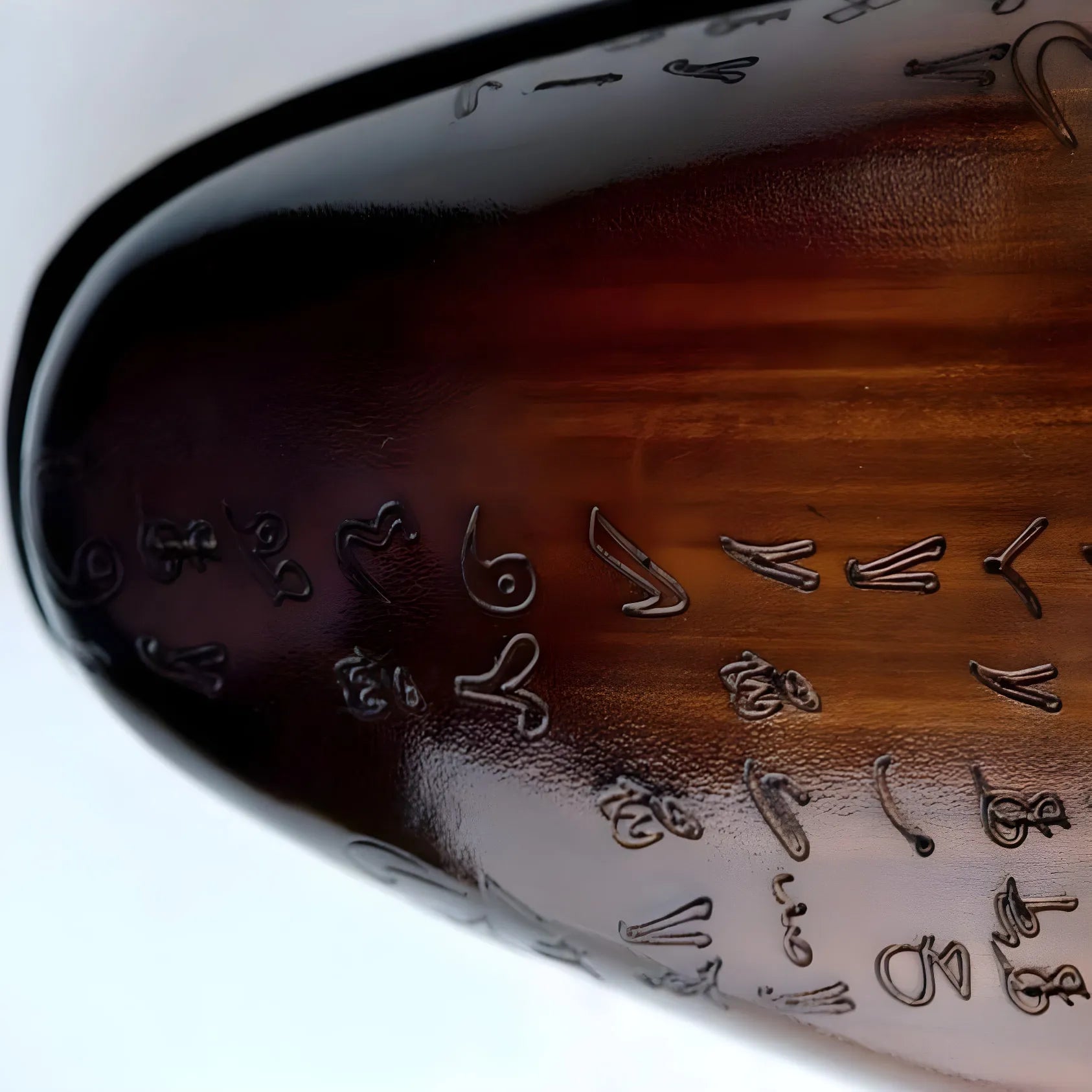 Brown glossy vessel with engraved symbols on Arabic matrix patina wholecut shoes