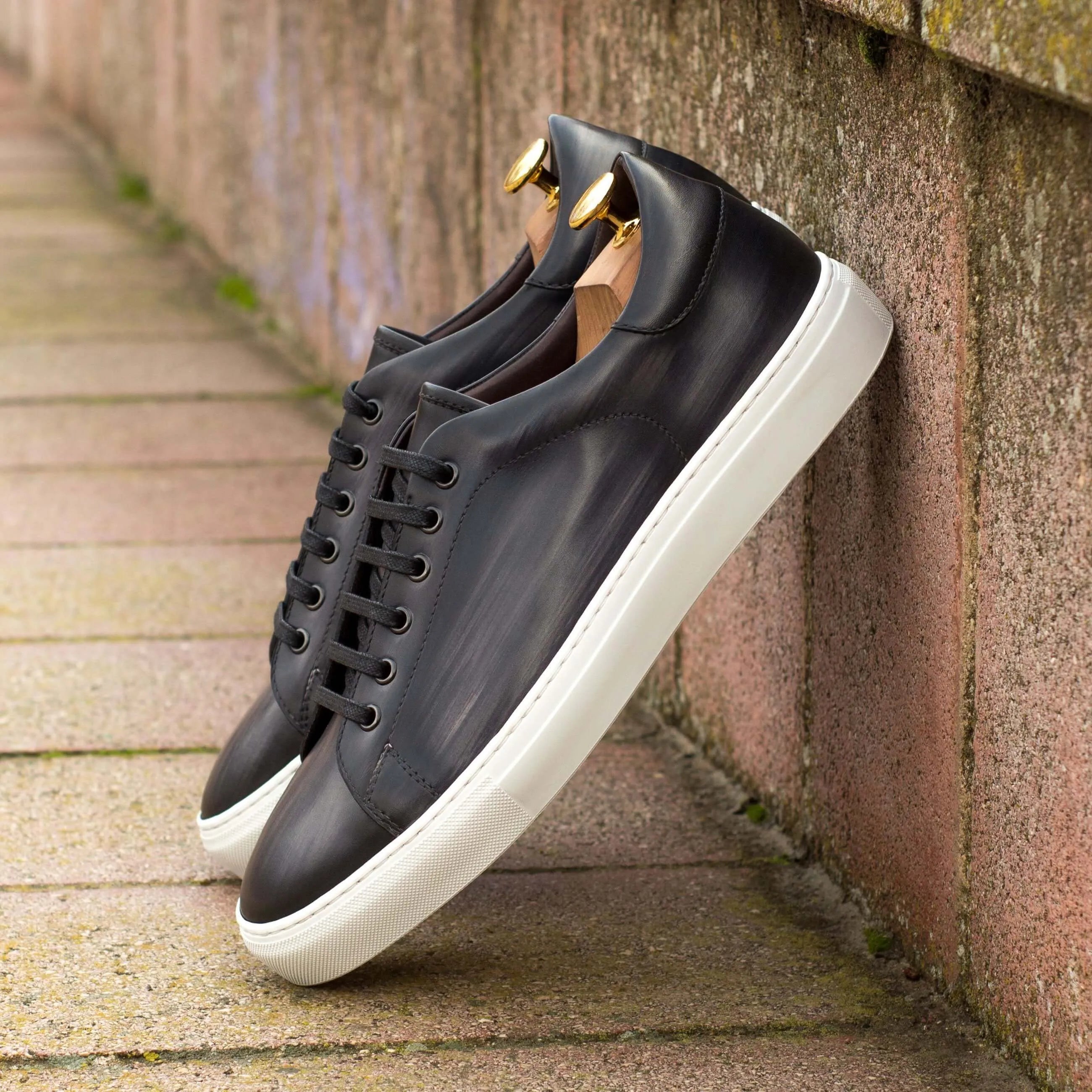 Black C68 trainer patina sneaker with leather upper and white cupsole