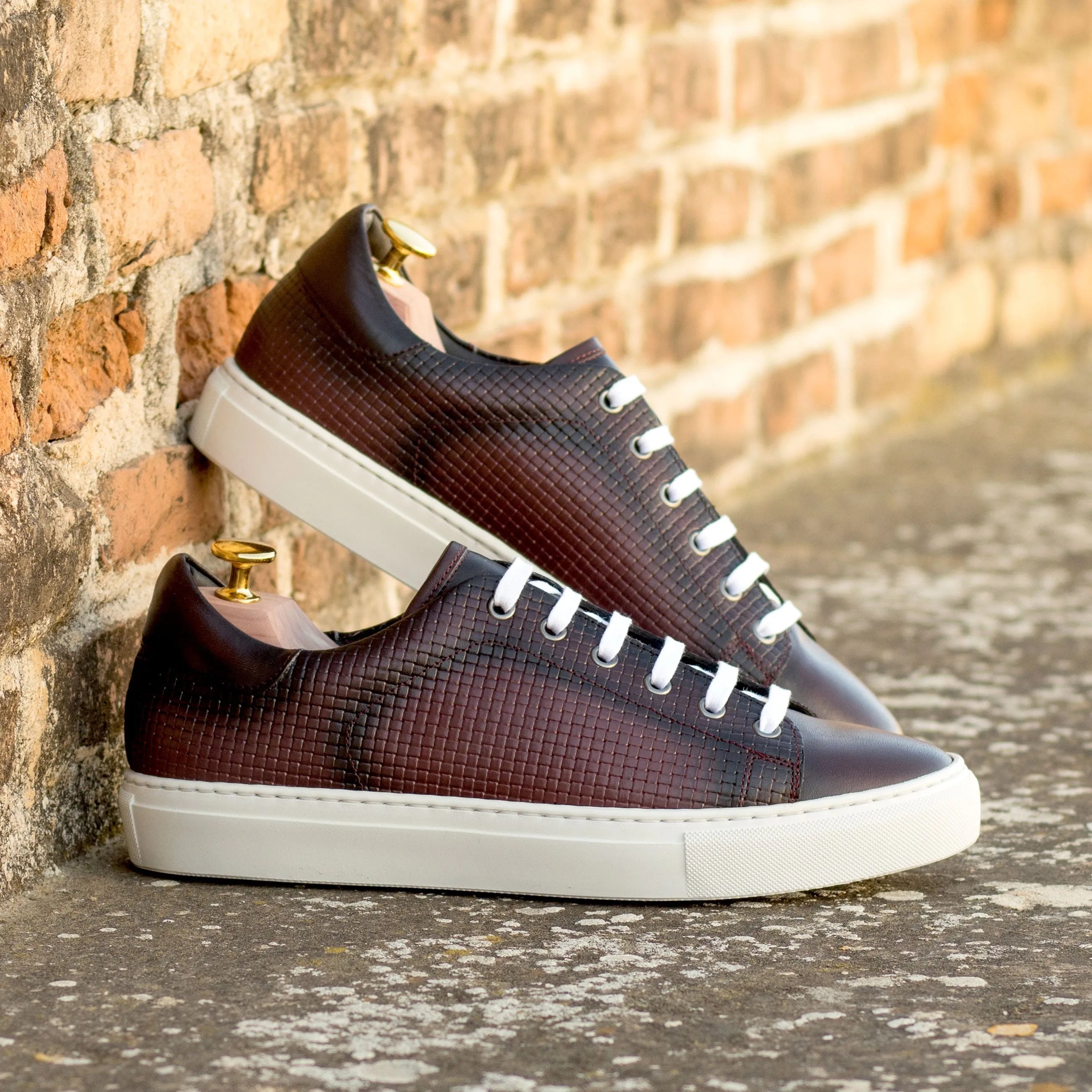 Pair of brown leather CapaOne trainer sneakers