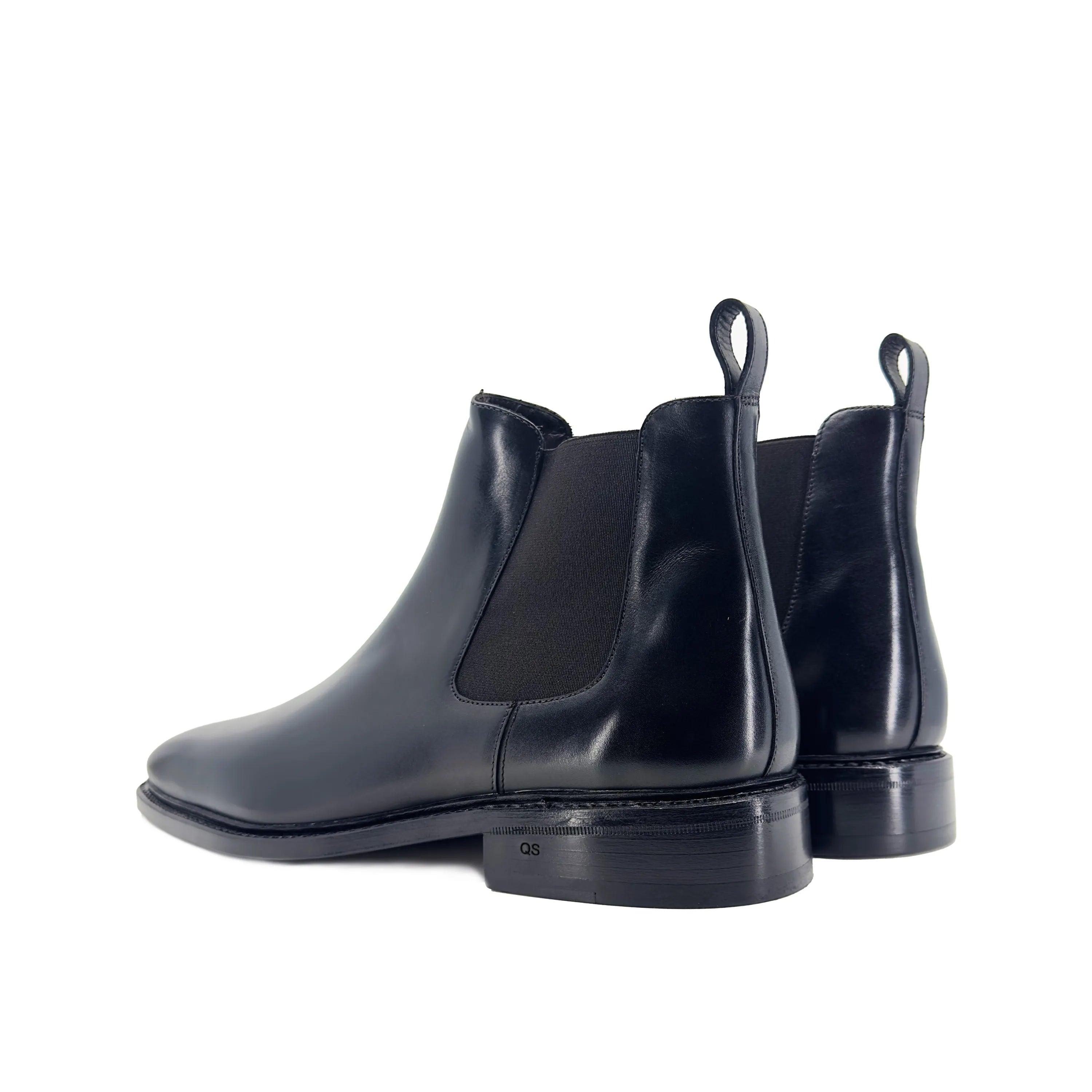 Pair of black leather Cave Chelsea boots