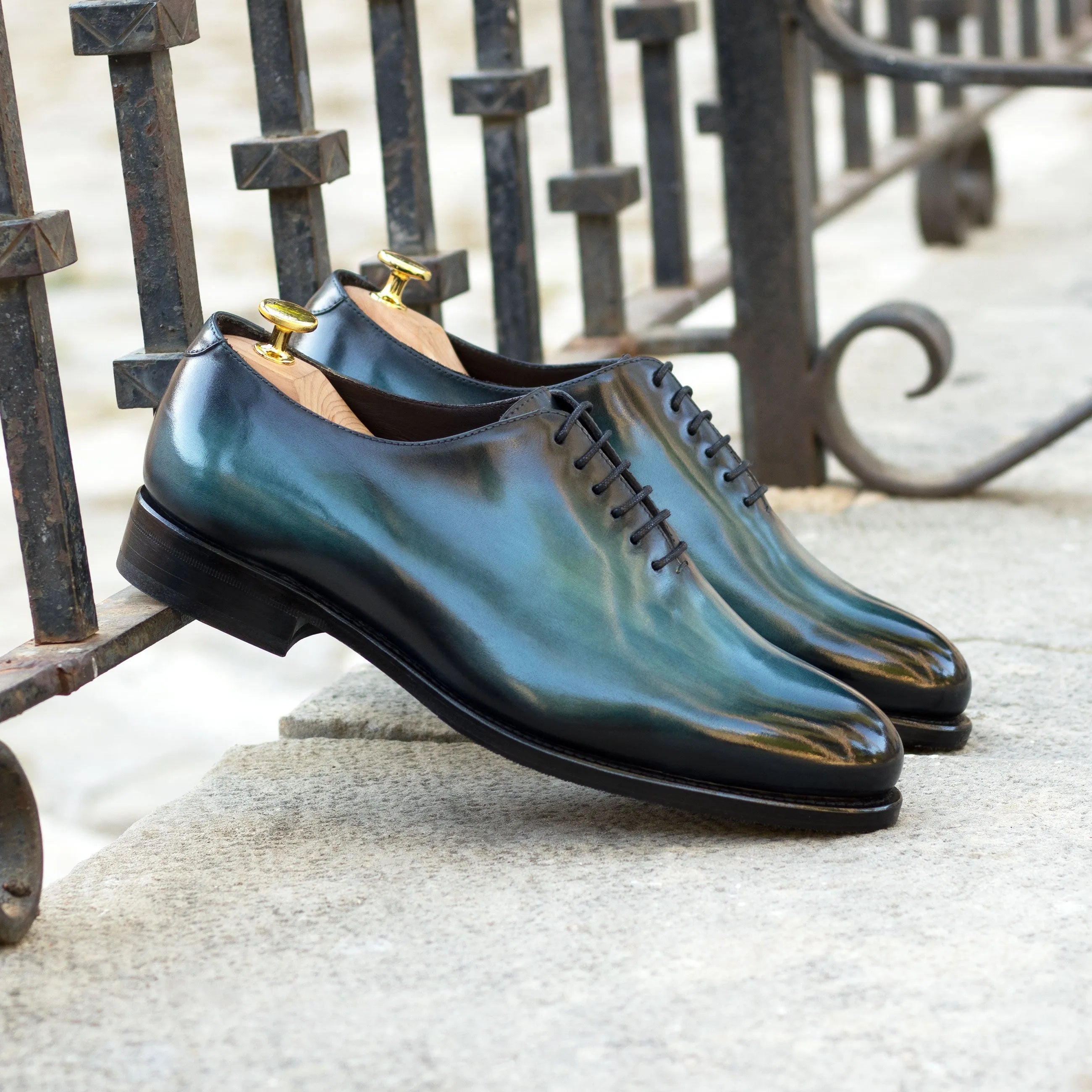 Deep Whole Cut Patina II iridescent dress shoes with turquoise patina, closed channel lacing