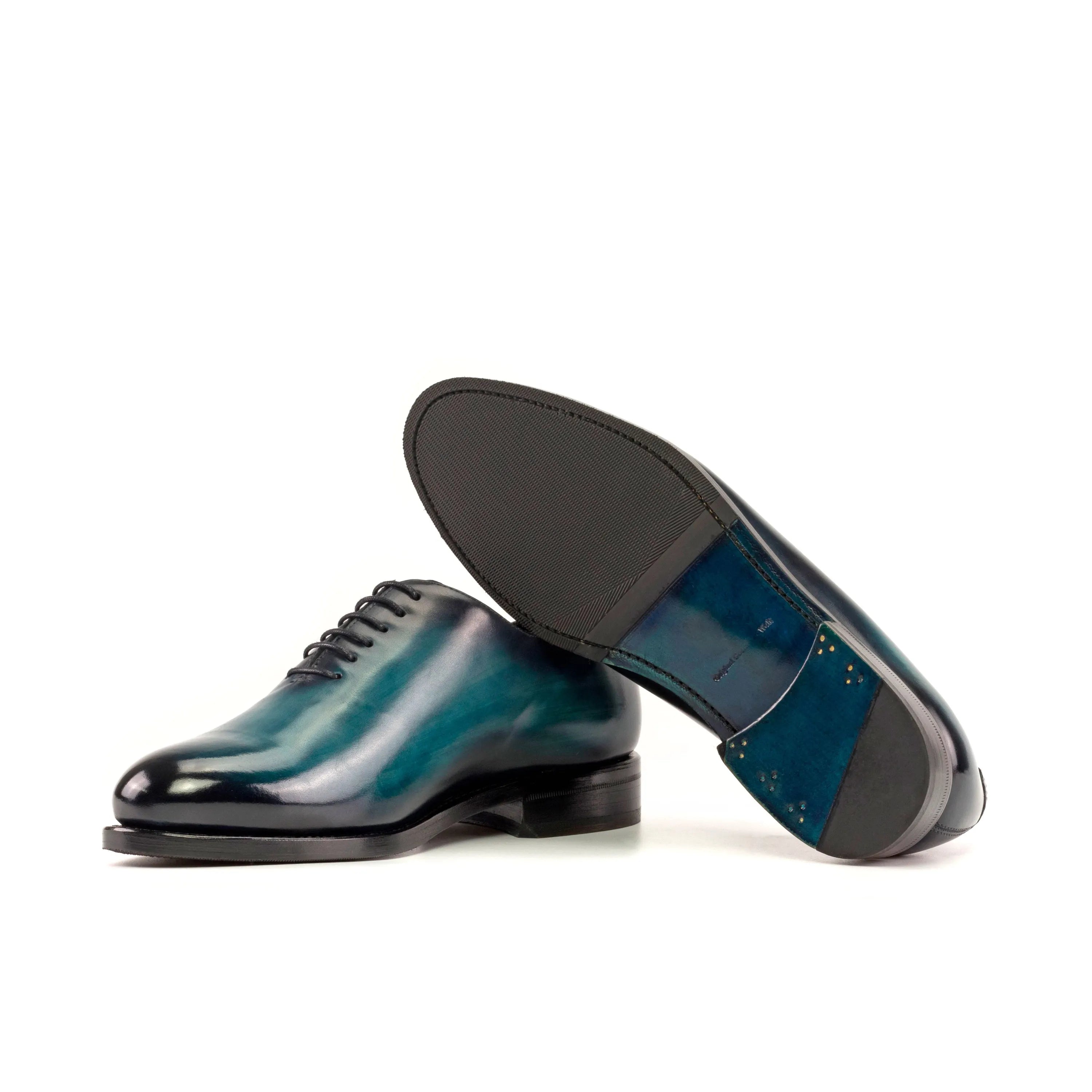 Deep Whole Cut Patina II two-toned shoes with turquoise patina, closed channel lacing