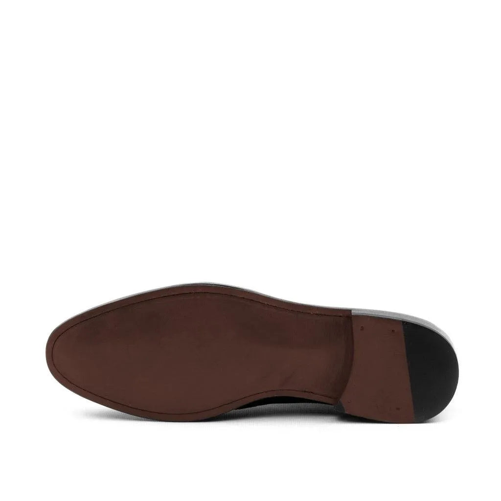 Brown shoe sole of Denion Military Brogue Boots in box calf