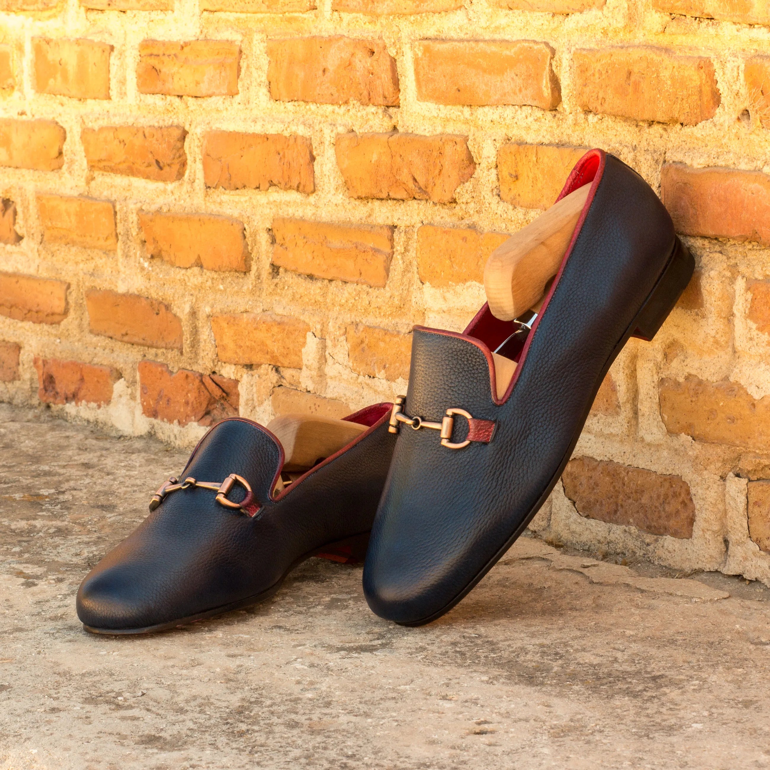 Dios Wellington Slipon leather loafers with gold hardware