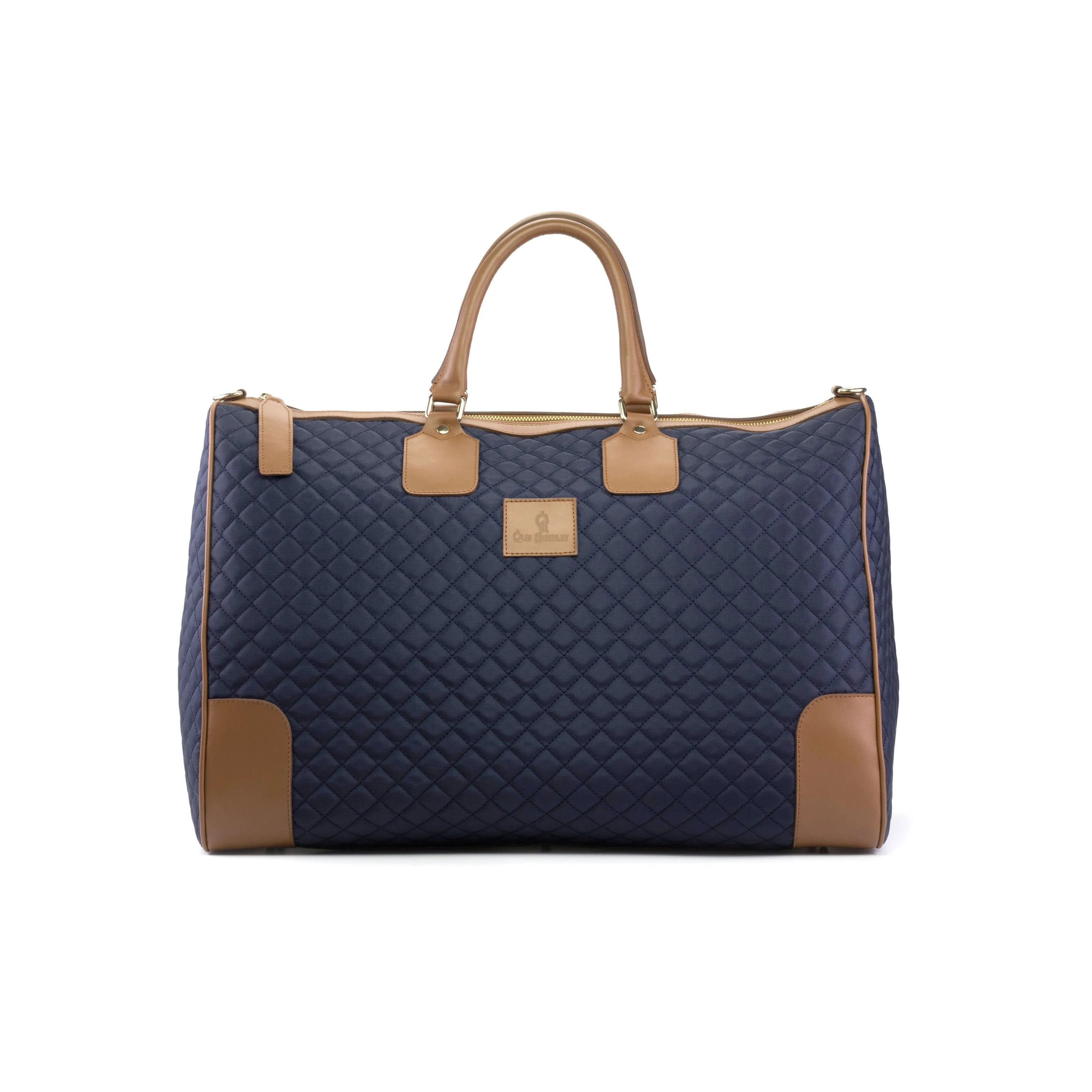 Navy quilted Donostia Weekender bag with tan accents for stylish travel