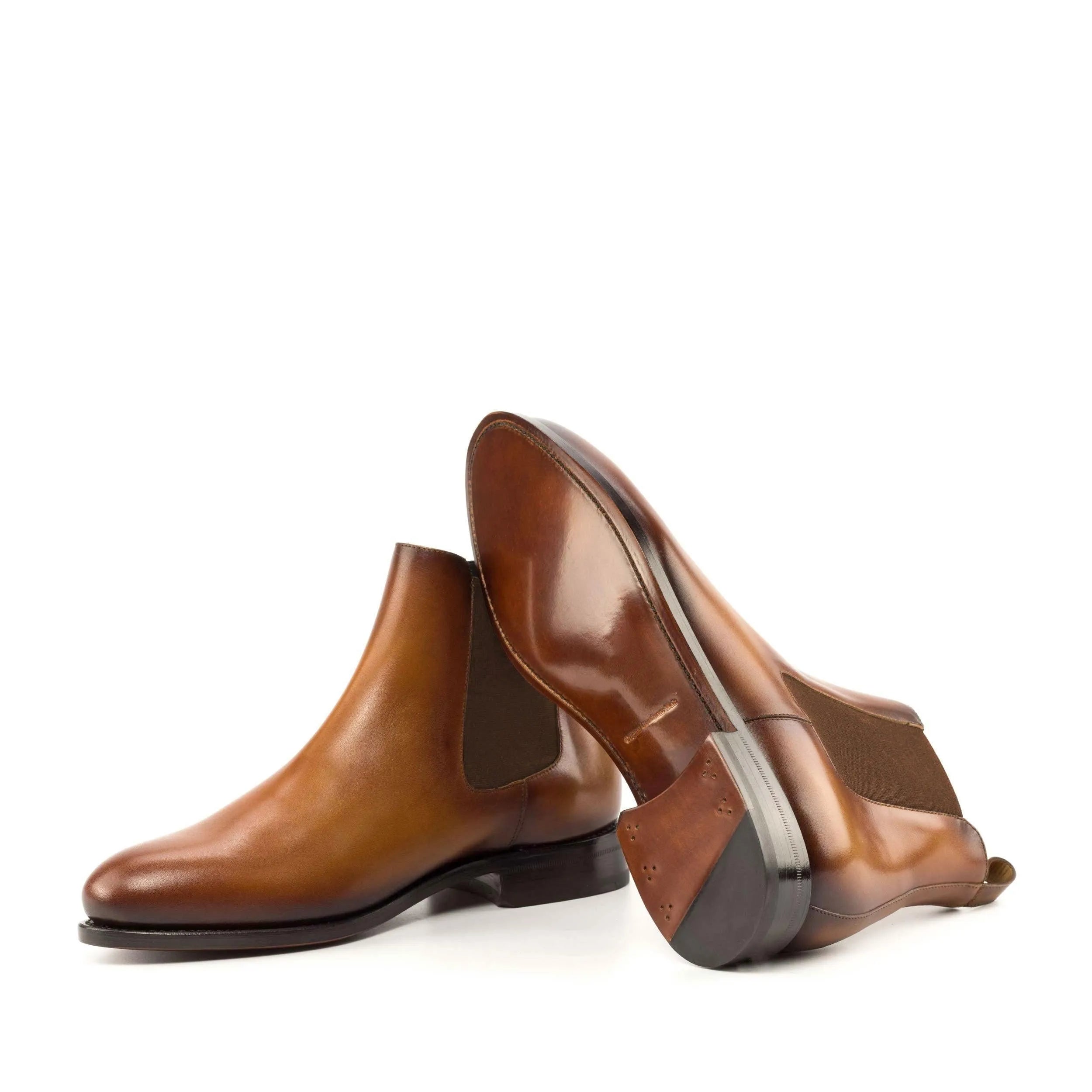 Pair of brown leather Fando Chelsea Boots in fast lane style