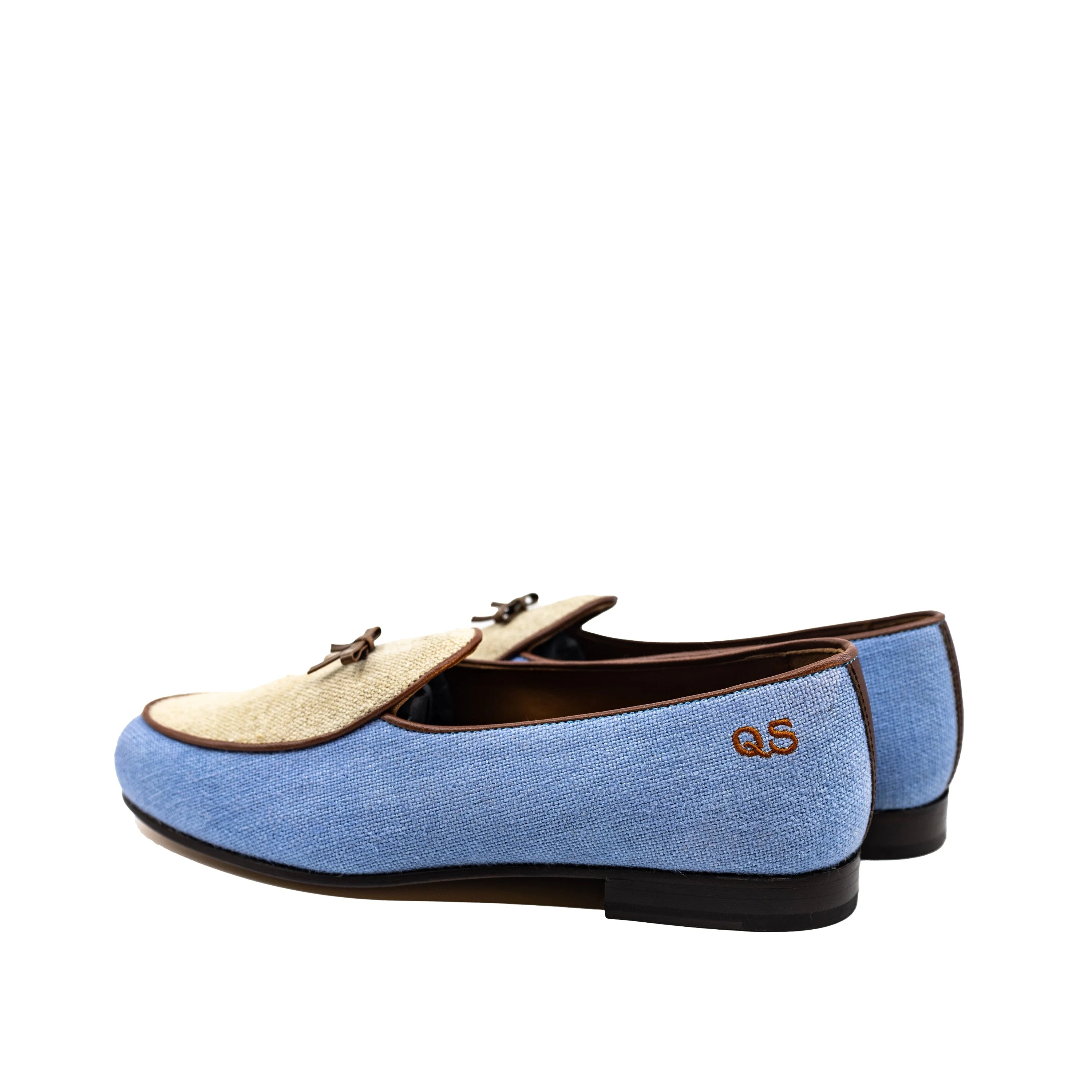 Back view of Fernandez Belgian Slipper II: light blue suede loafer with gold accents and QS monogram on heel