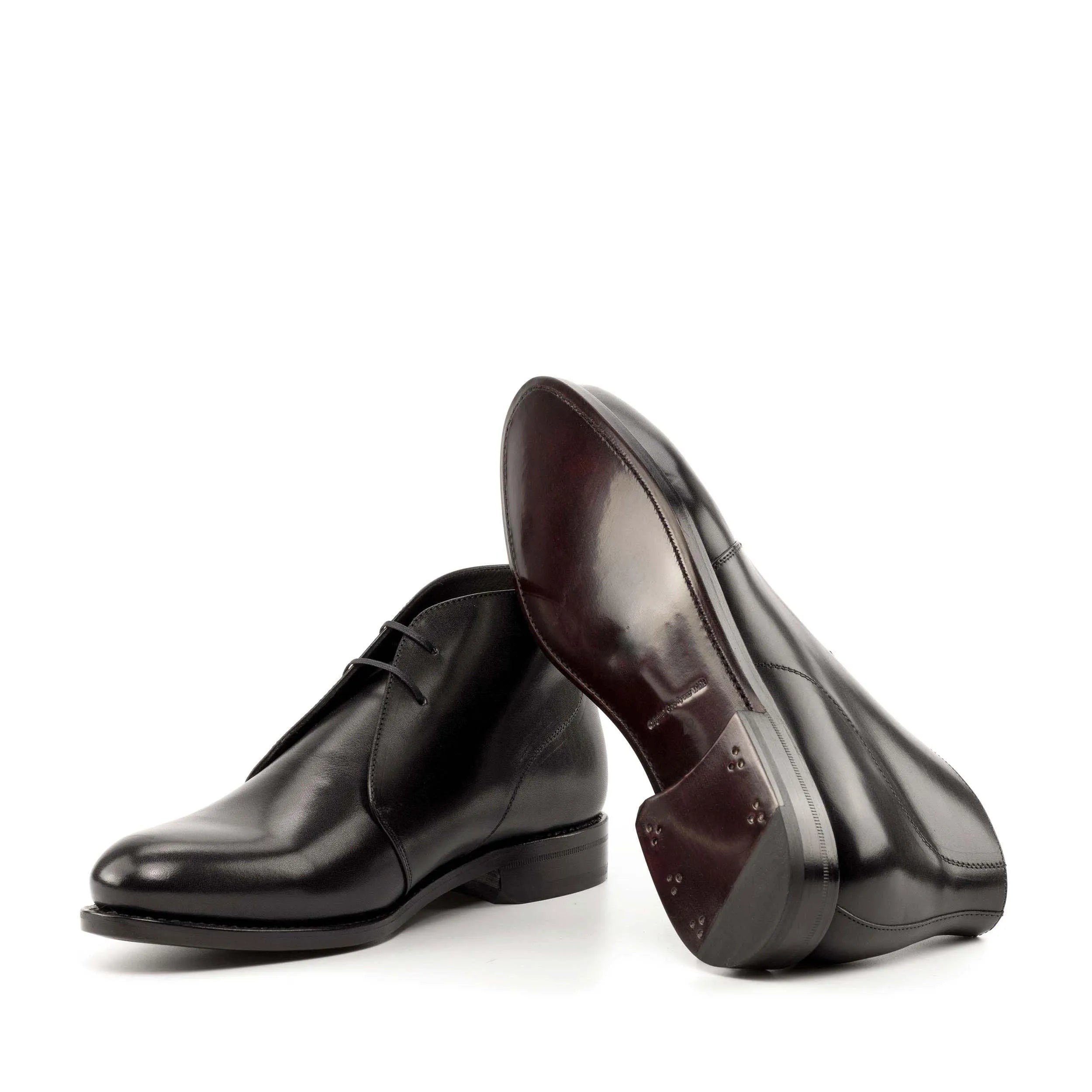 Pair of black leather Filmar Chukka boots, fast lane style