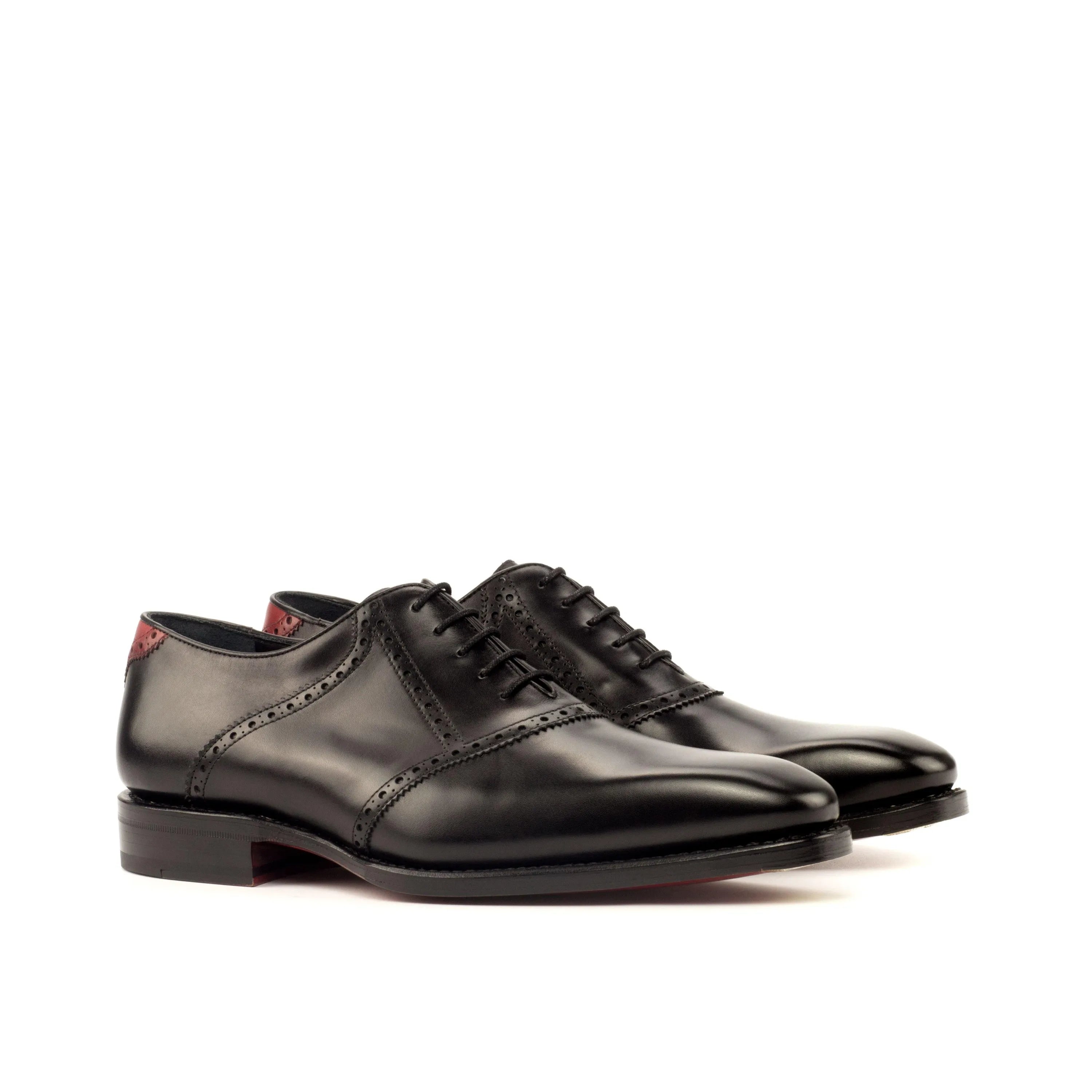 Pair of black leather Iron Saddle shoes