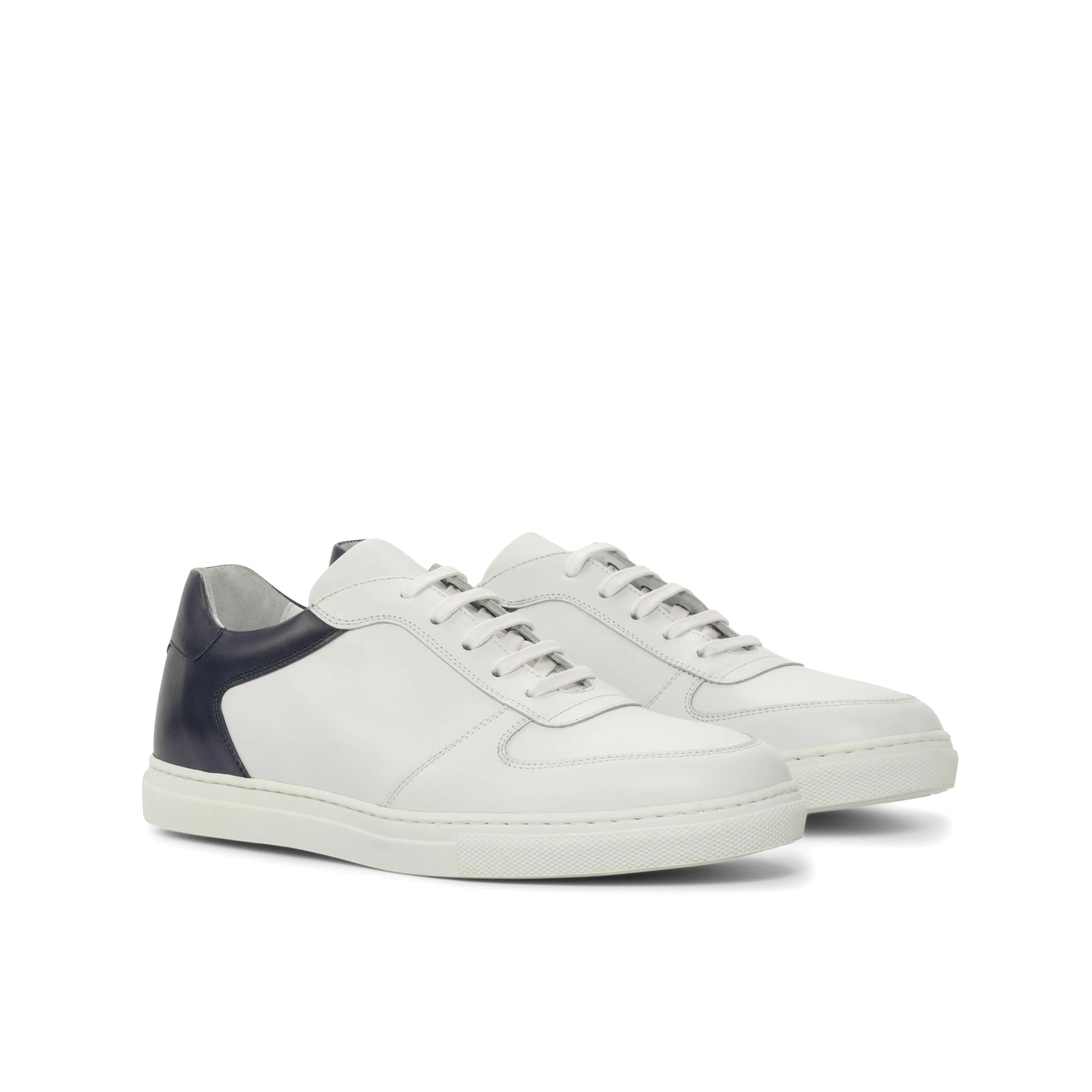 Back view of Janko Low white leather trainer sneaker with navy heel