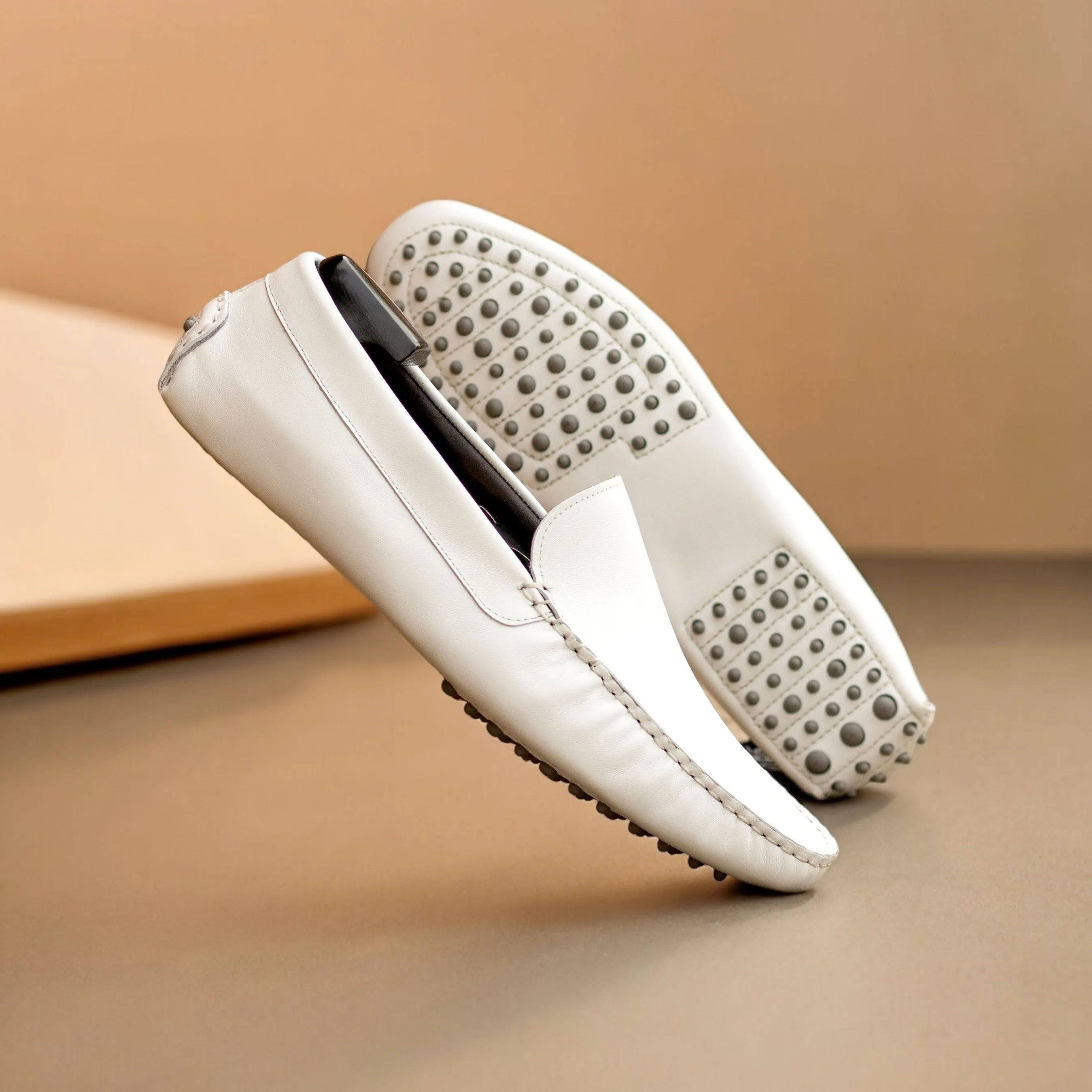 Pair of white leather Lincoln RD Driver loafers