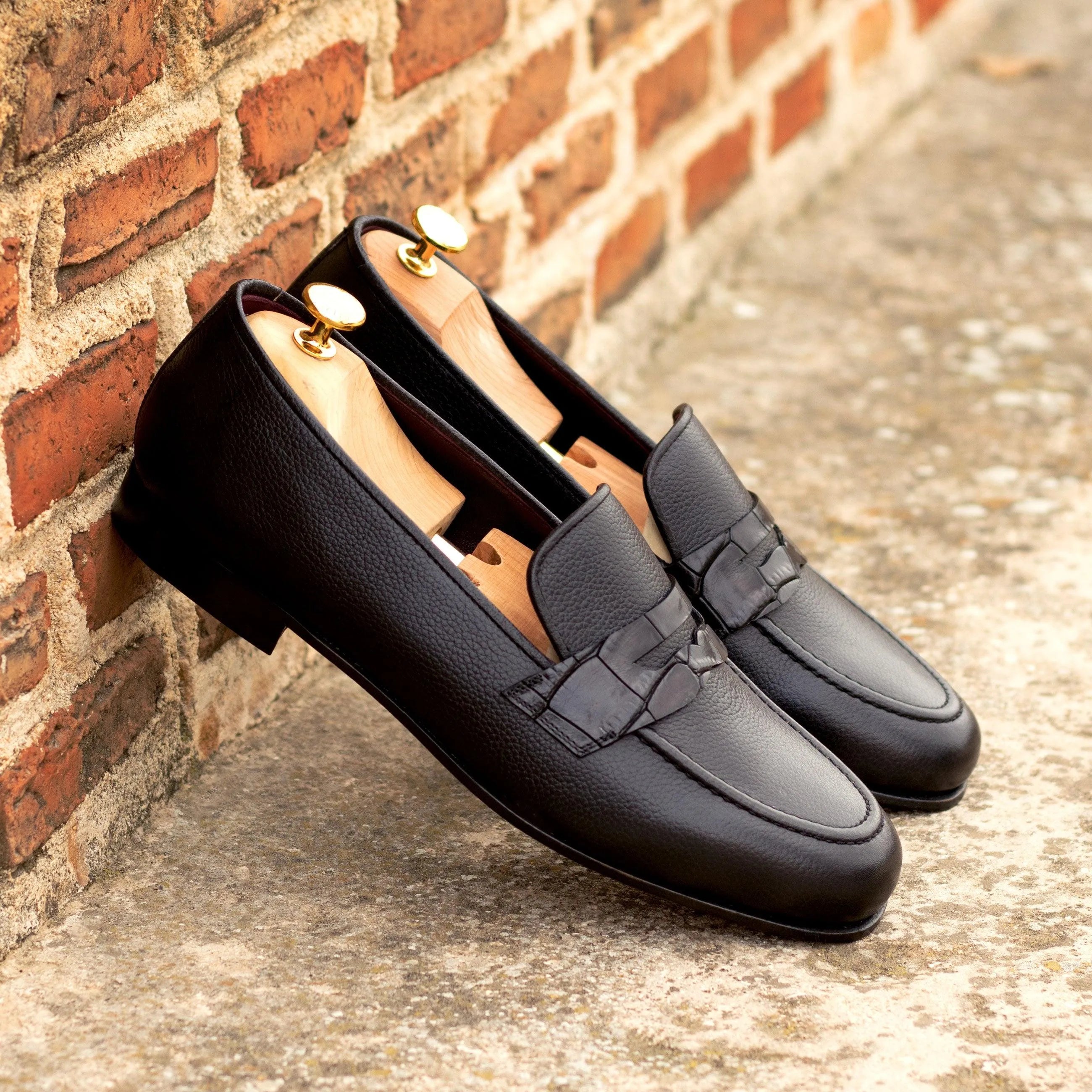 Black leather penny loafers on Patron Wellington Slip On II