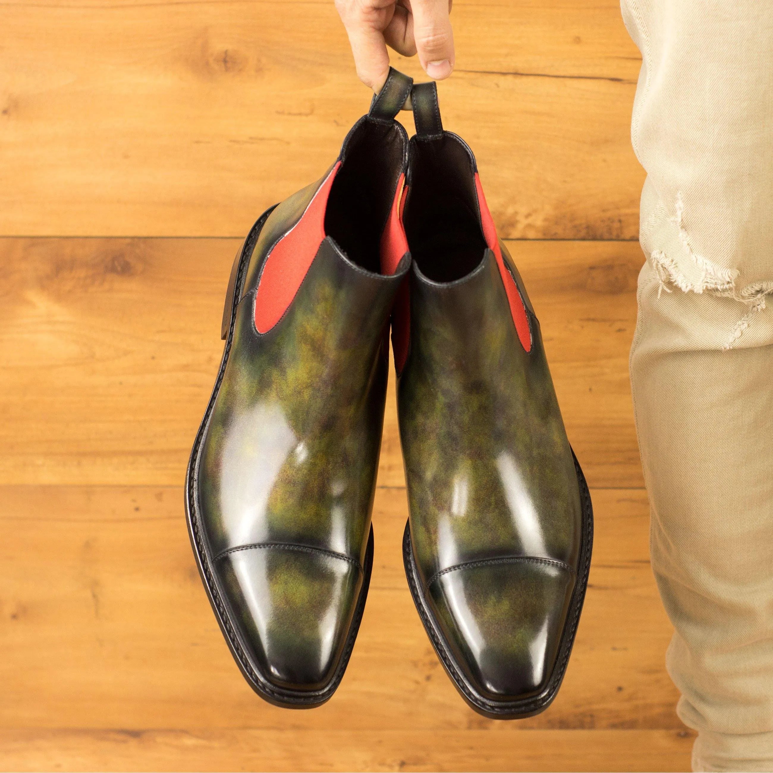 Salvatore Patina Chelsea boots in green and black leather