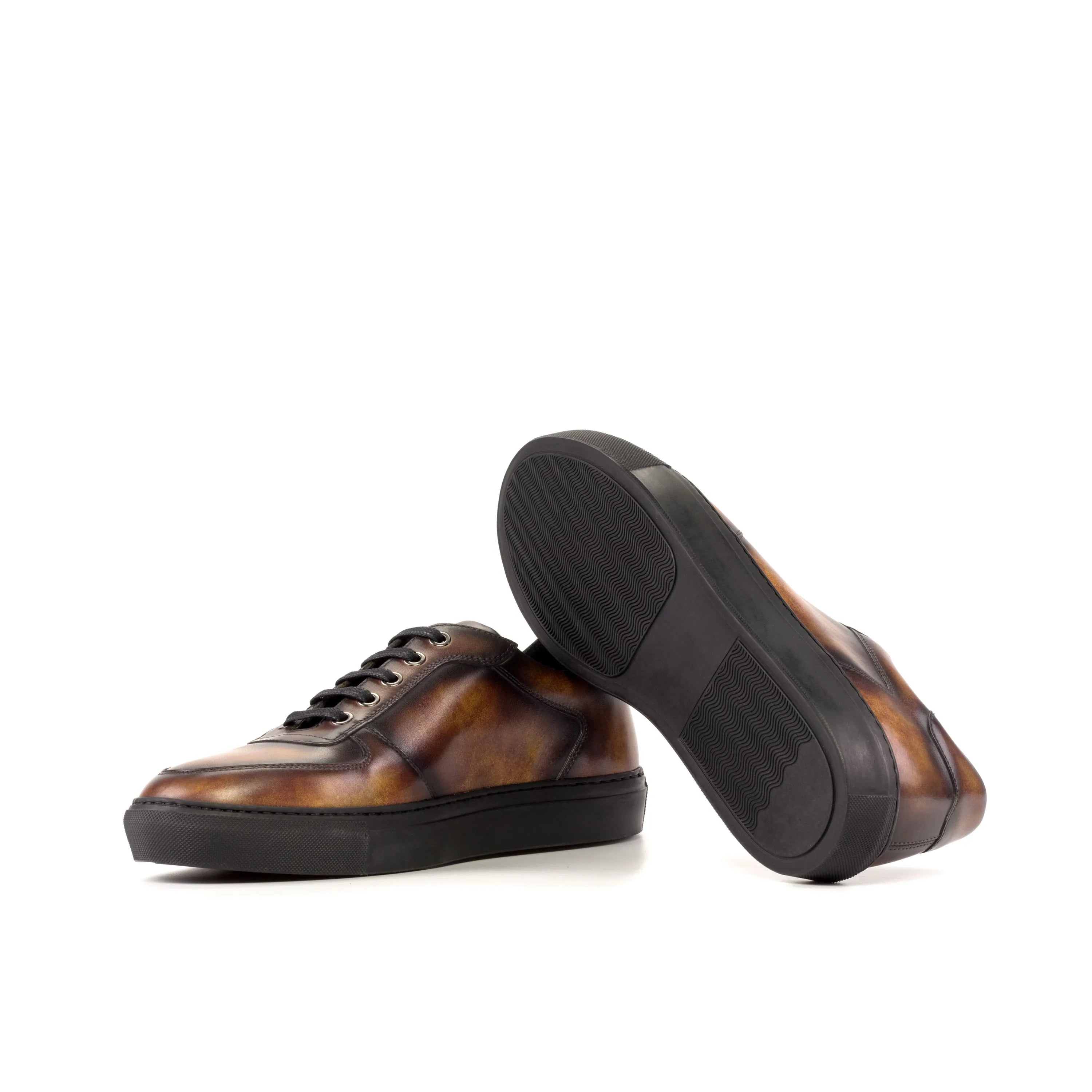 Talsa Patina low top sneaker in brown leather with black soles
