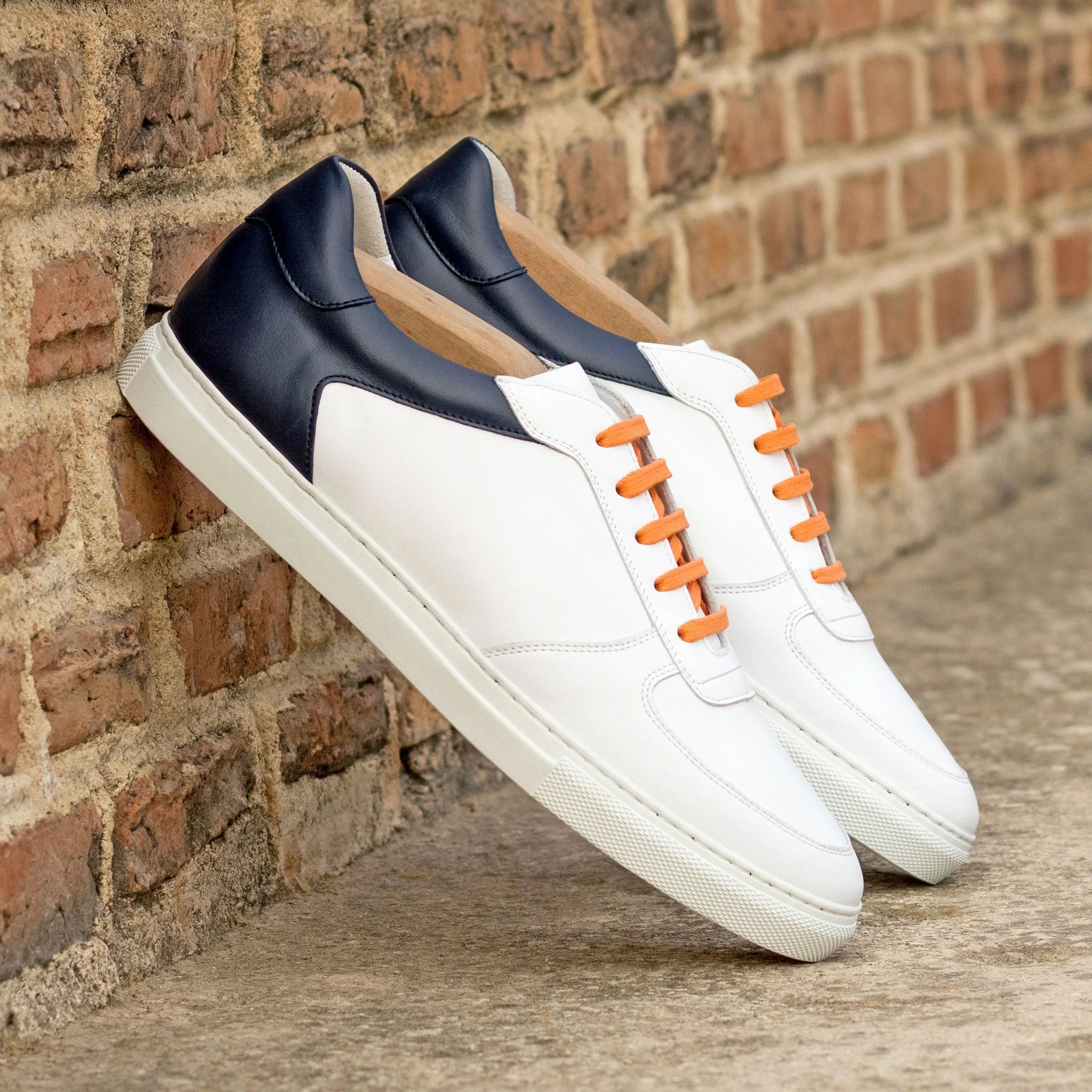 Tommaso Low navy nappa leather sneakers with orange laces