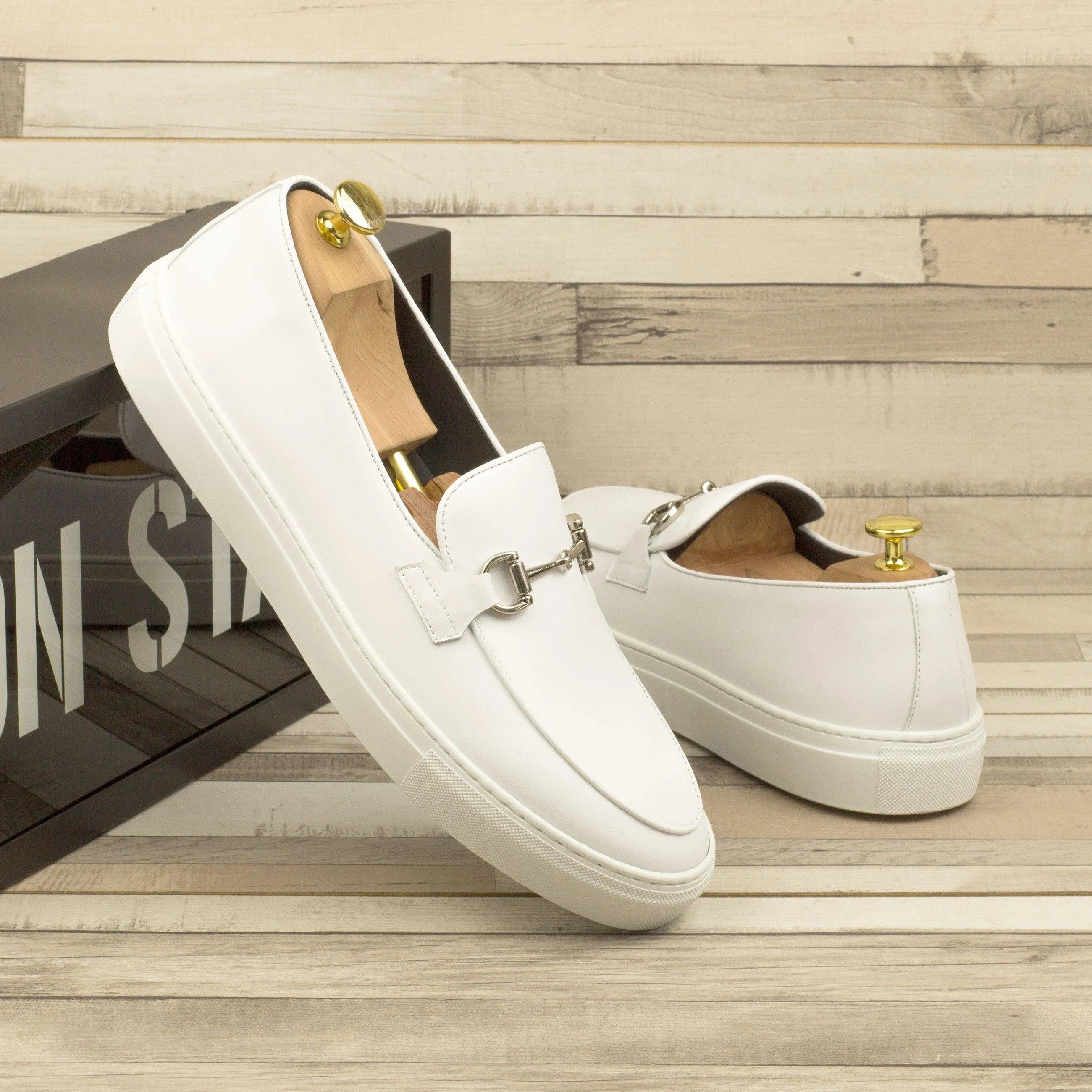 Pair of white leather Tony Belgian sneaker loafers