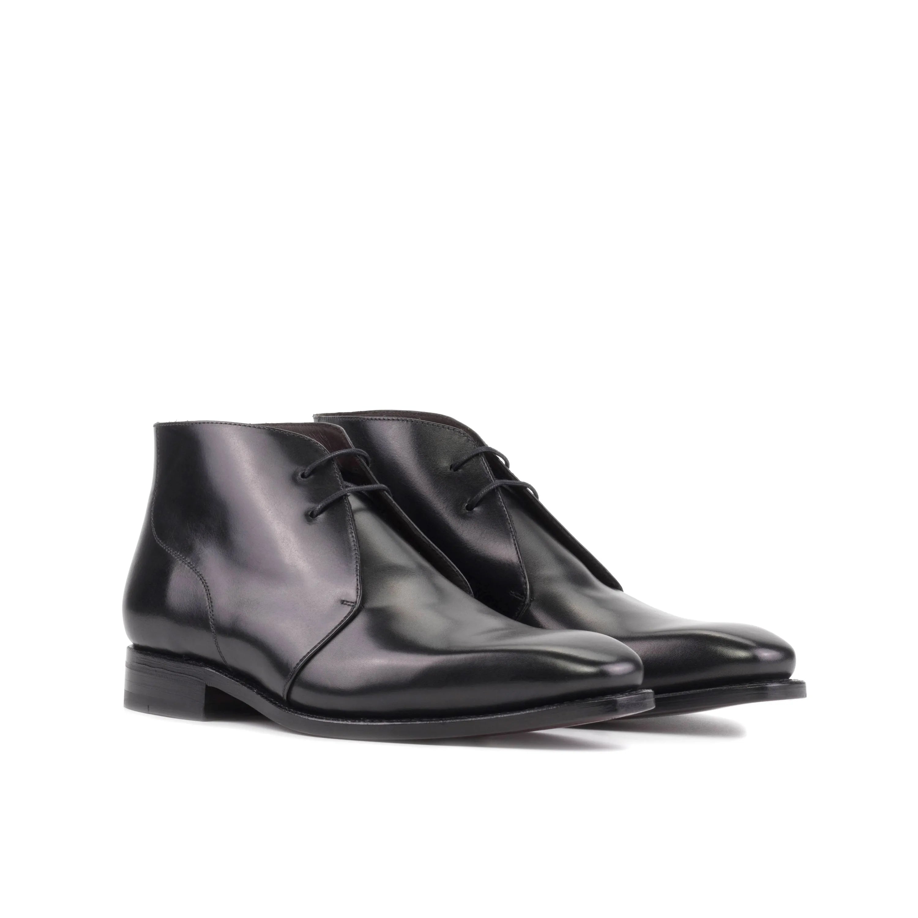 Pair of black leather Winsor Chukka boots in fast lane style